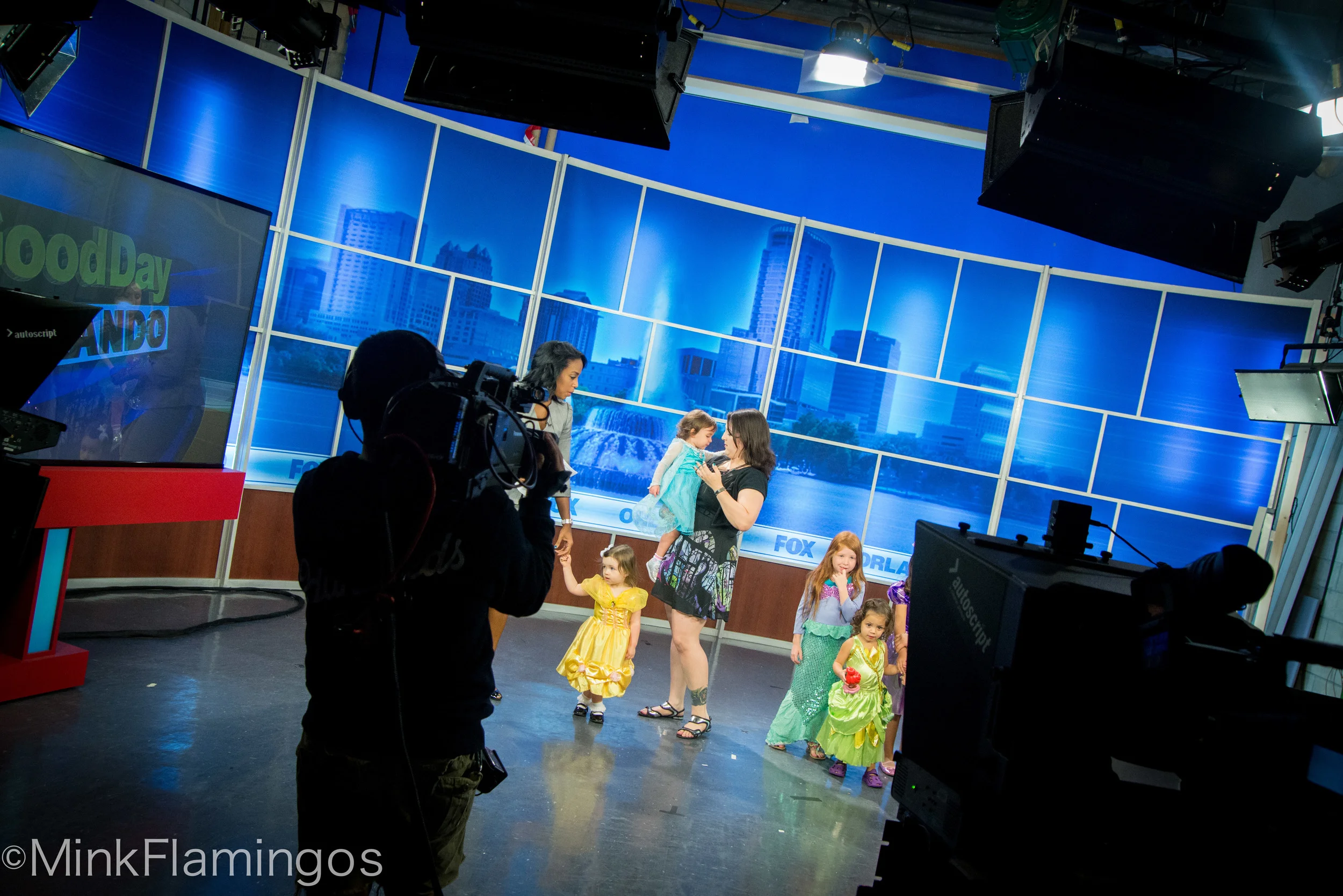 Me, on TV, talking about Disney Heroines, wearing a dress covered in Maleficent's glorious visage
