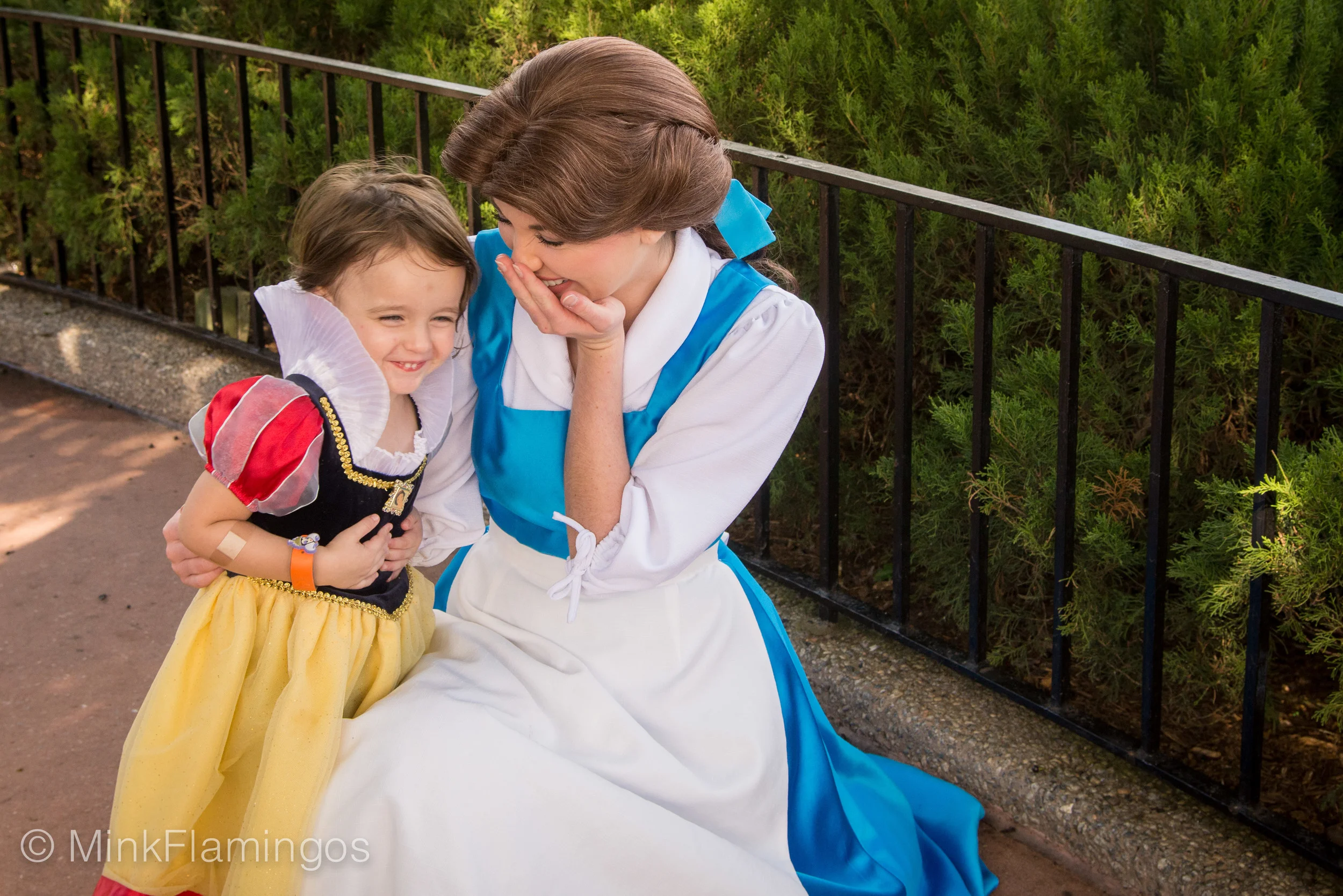 The signature "behind the hand" Princess giggle