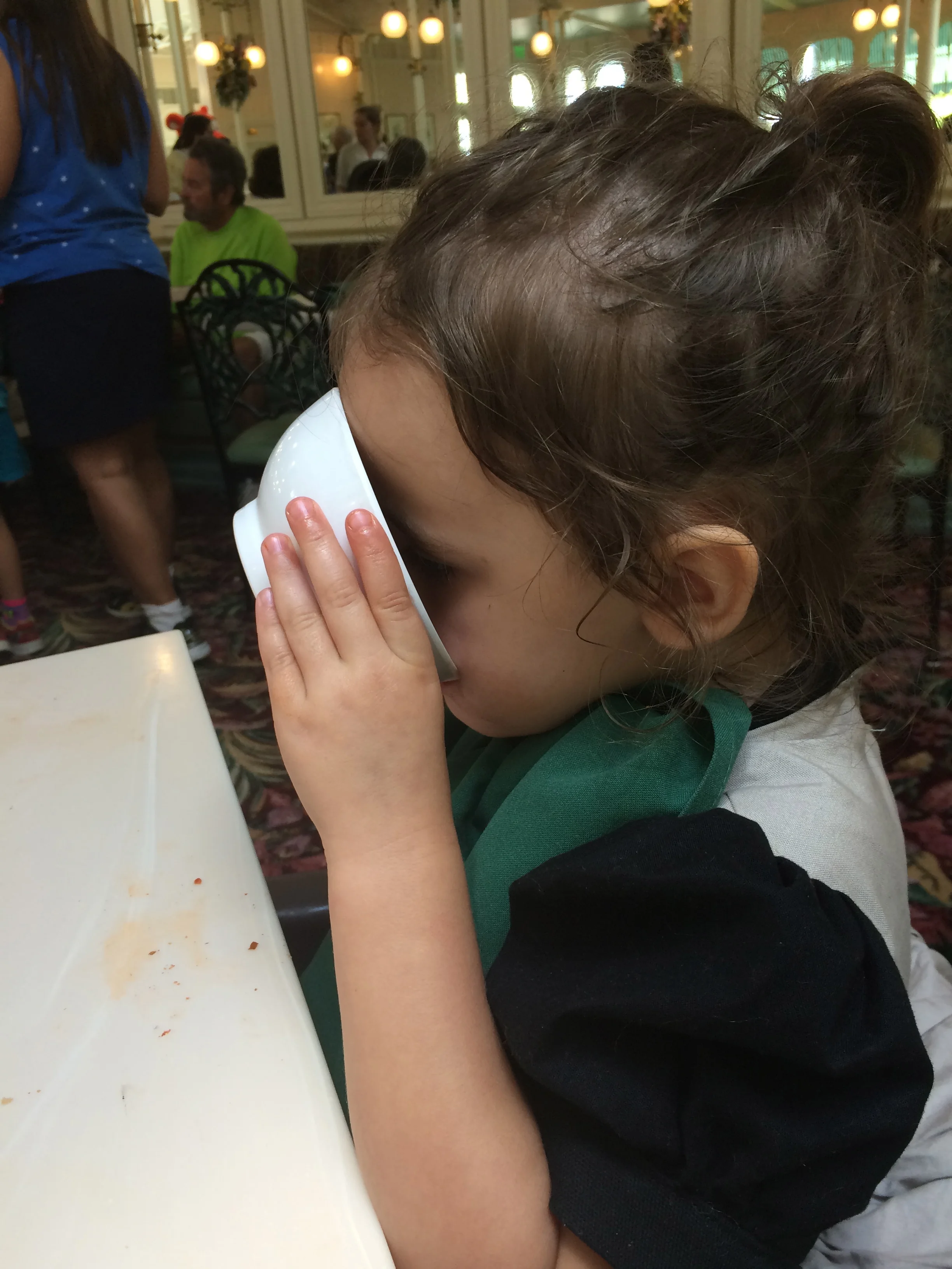 Finishing her ice cream