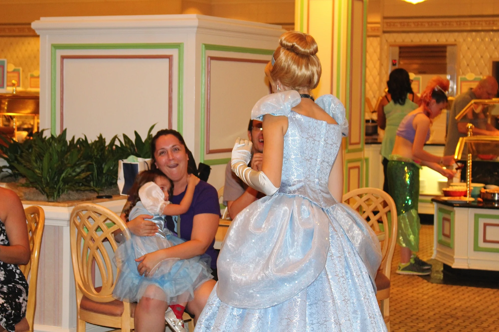 Bella's mom got a great shot of the confusion on my face while D refused to talk to Cinderella
