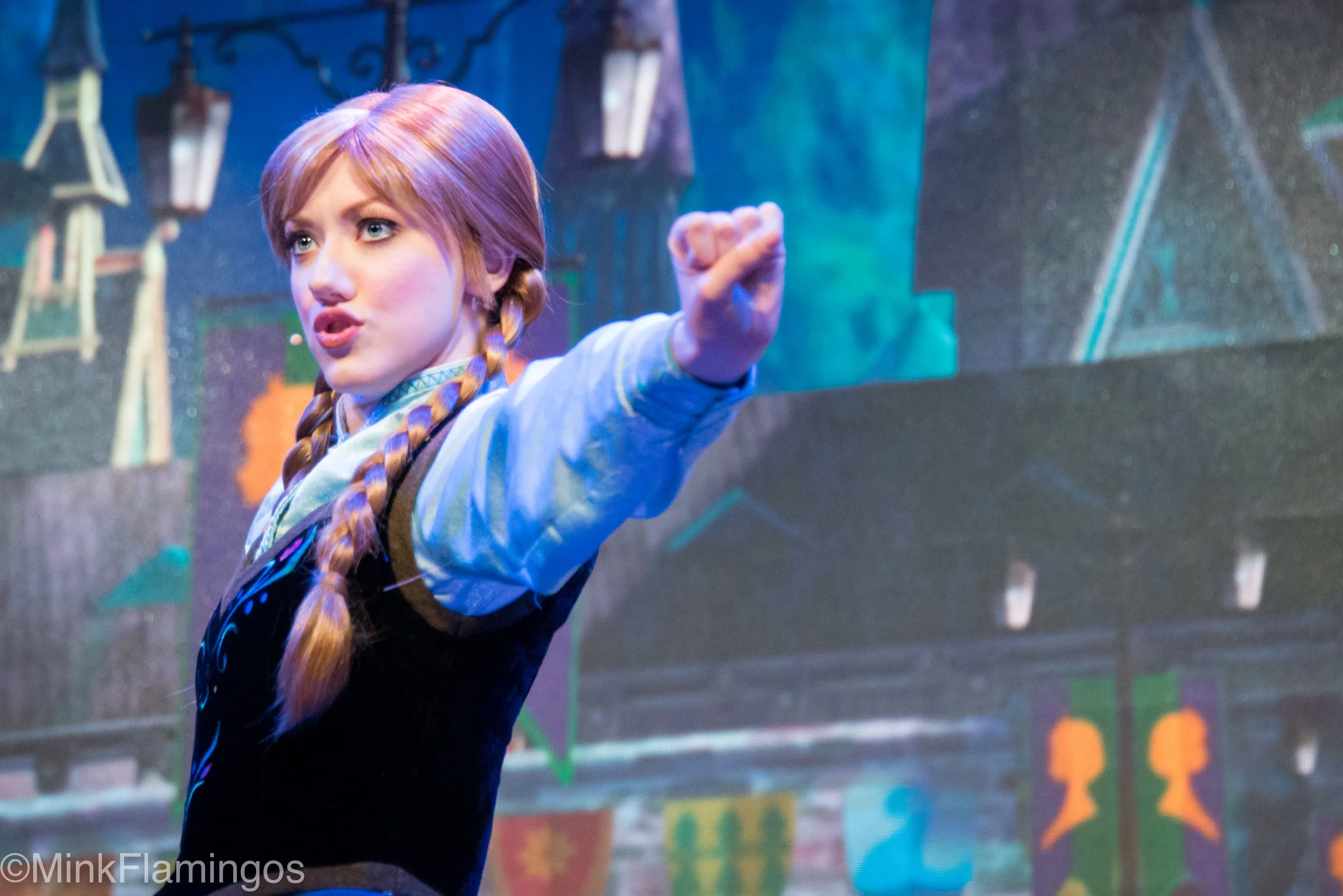 Anna's arm is more out of focus the further it is away from her face