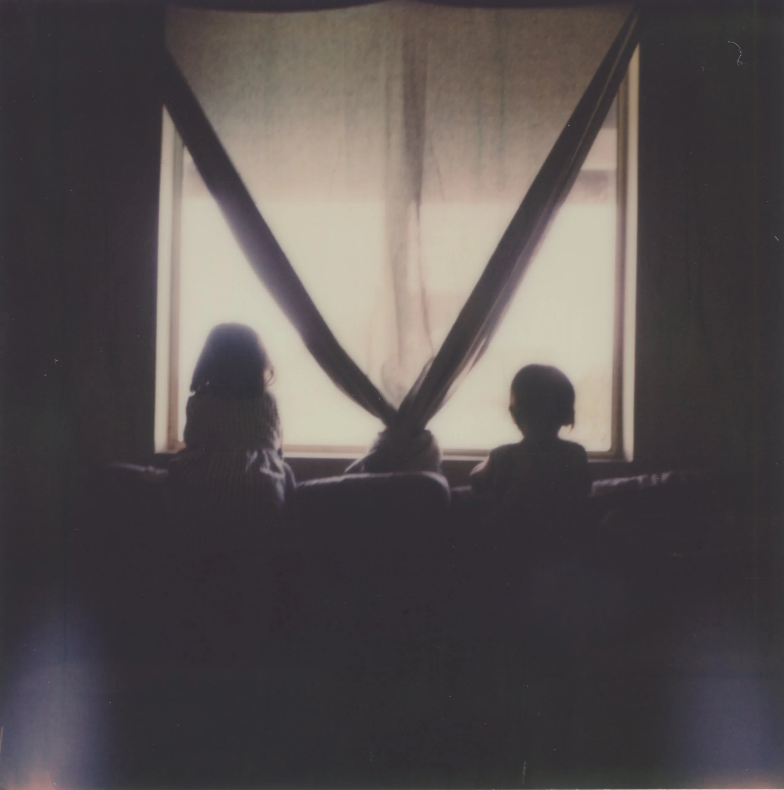 Vivian and Eleanor Separated By Curtain