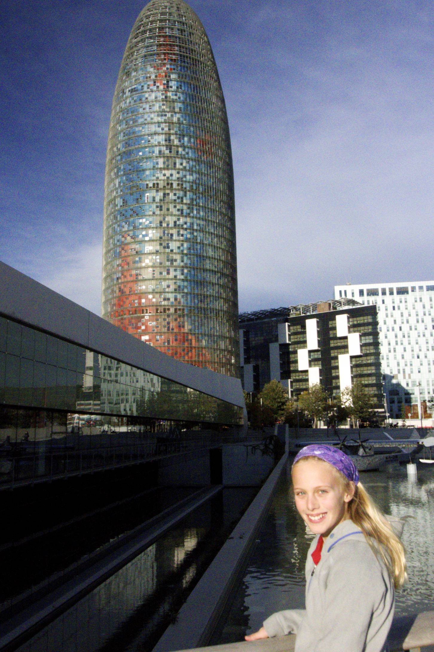 Zoe outside the Museum of Design in Barcelona with the Torre Agbar in the background. 