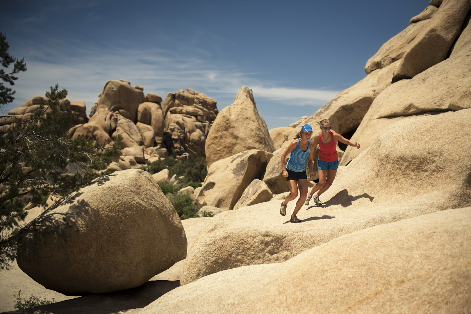 Anna & Katy hopping around Joshua Tree National Park.