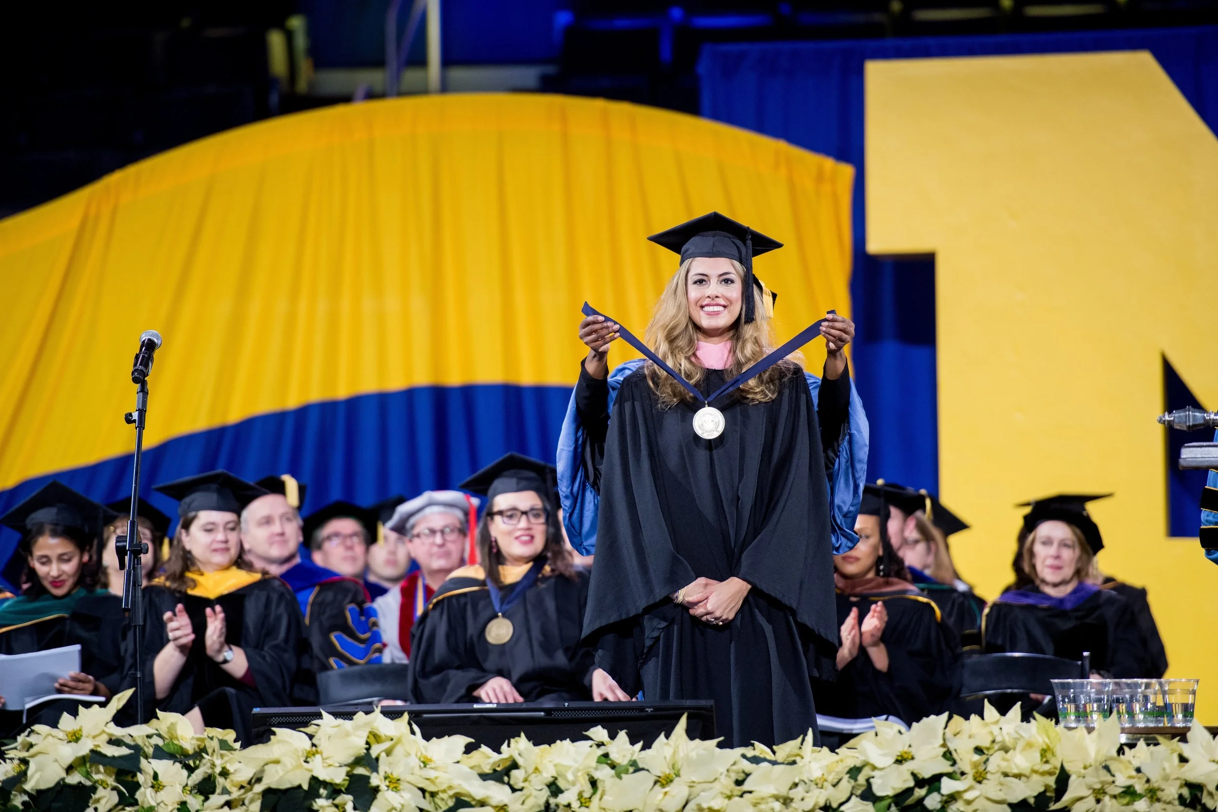 receiving a 2017 Bicentennial Alumni Award from University of Michigan