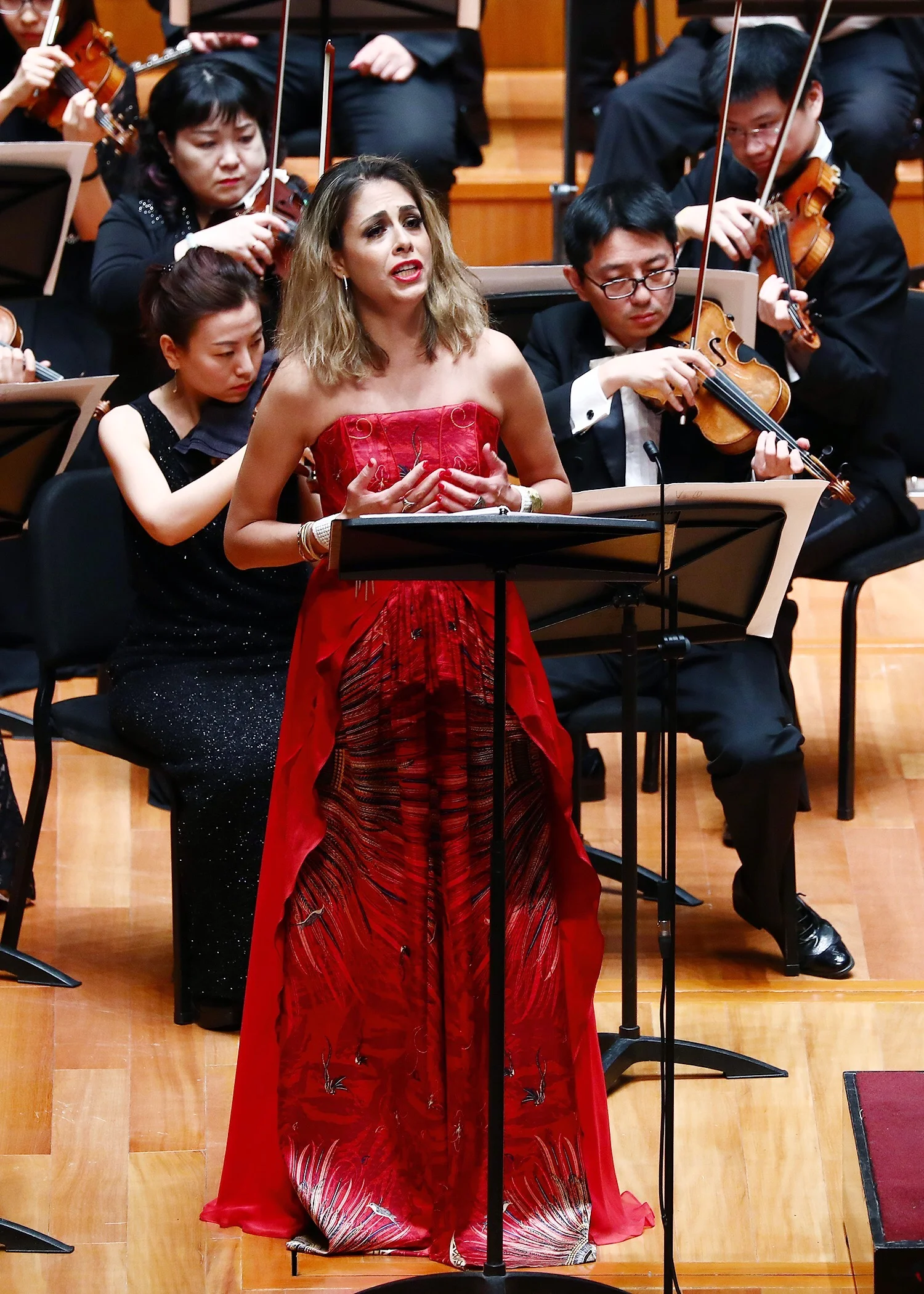 performing with the China National Symphony Orchestra in Beijing, China