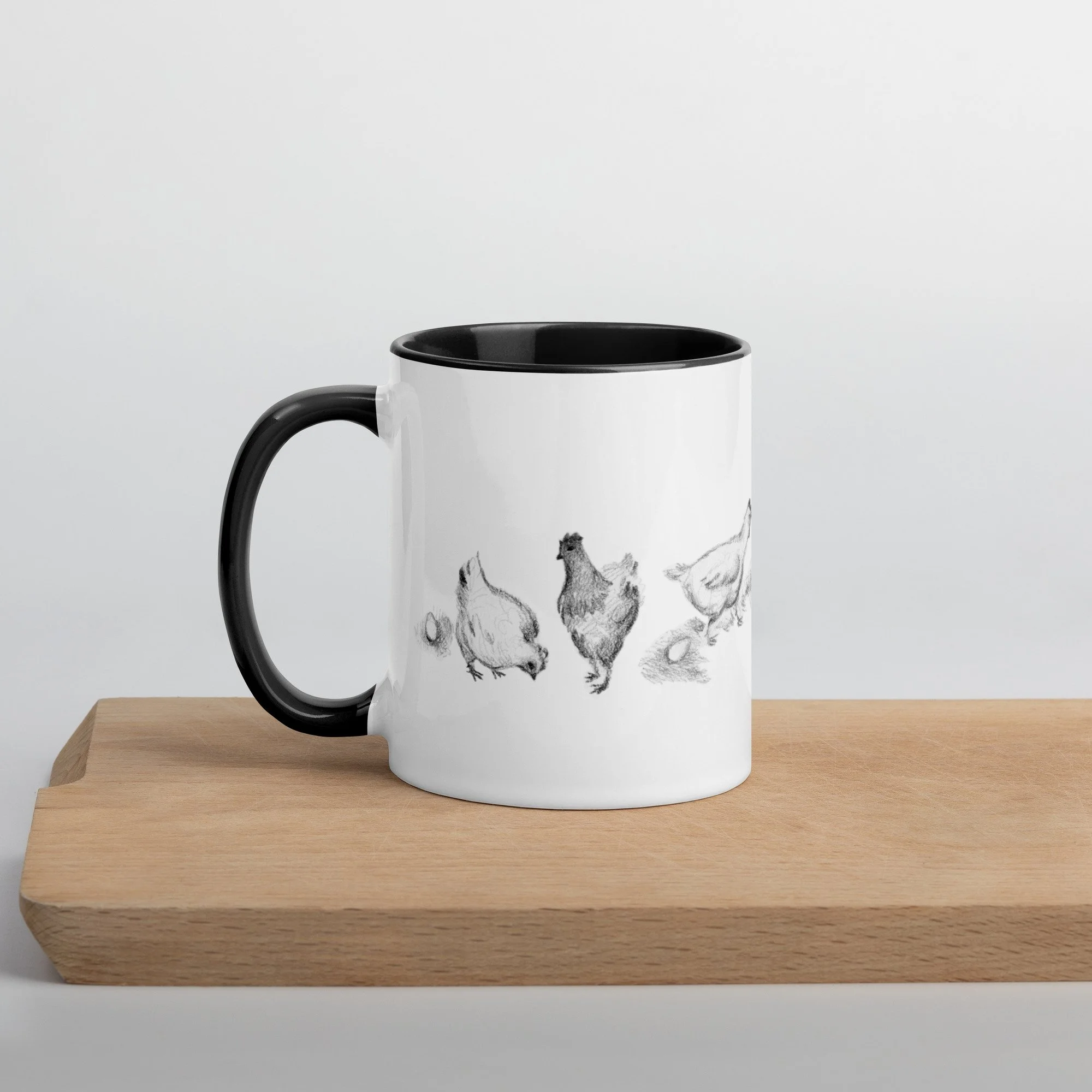 white-ceramic-mug-with-color-inside-black-11-oz-left-6569e6833b764.jpg