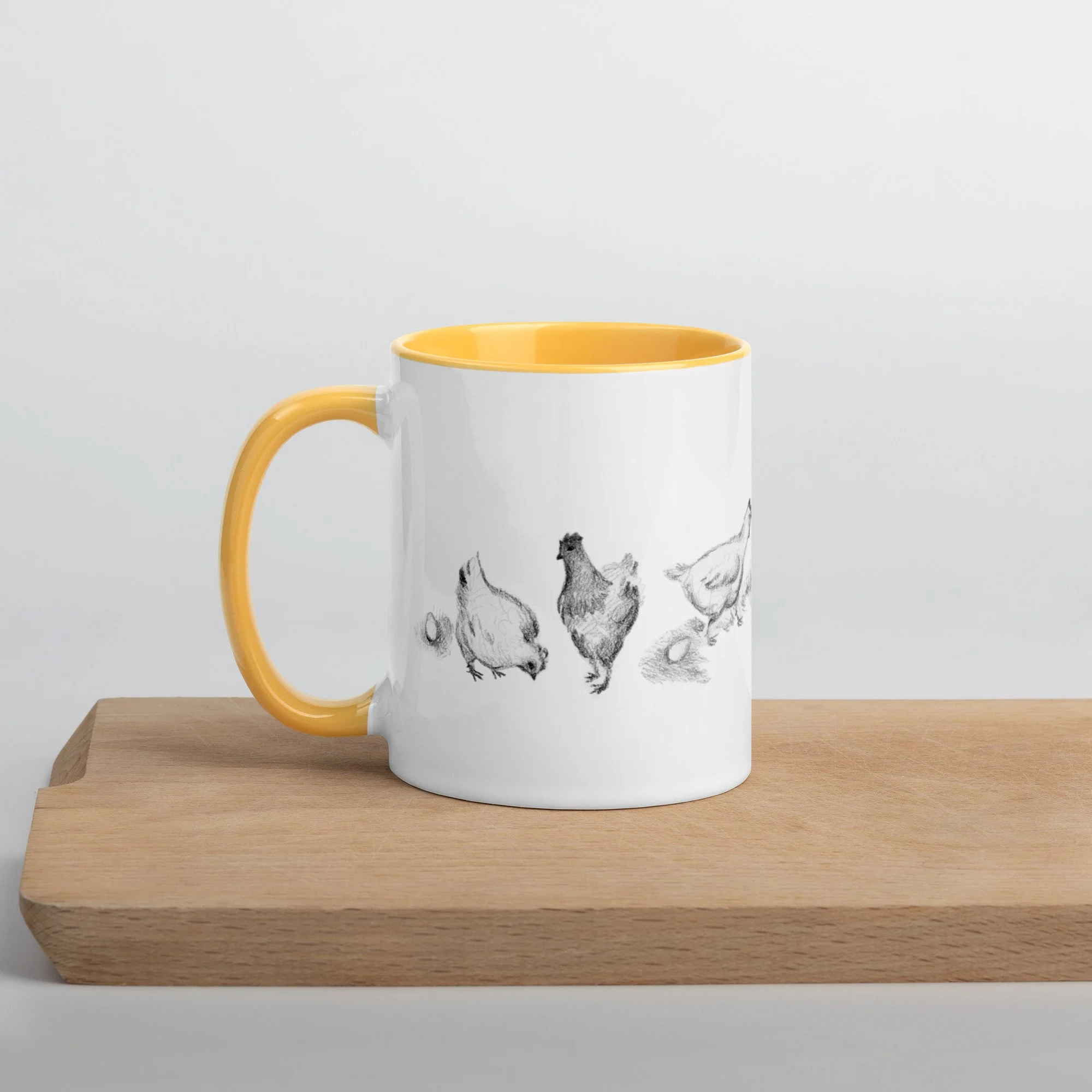 white-ceramic-mug-with-color-inside-golden-yellow-11-oz-left-6569e6833c46c.jpg