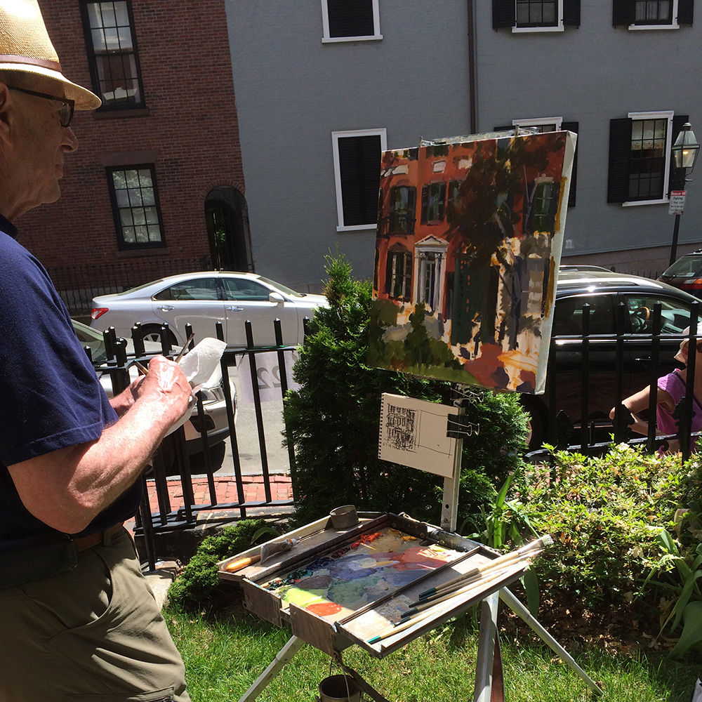 Vcevy Strekalovsky puts the finishing touches on his painting at the Nichols House