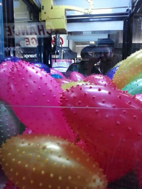 Spiky football claw machine selfie!