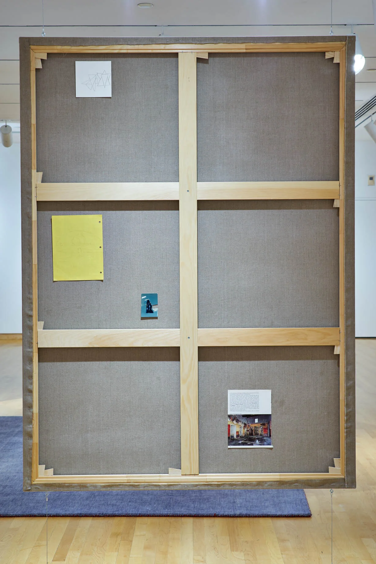   8.25 Minutes , (detail) installation comprised of six 76” x 56” oil on linen paintings, wool rug, hanging hardware, tape, printed materials, and drawings on paper, 2016-2017. 