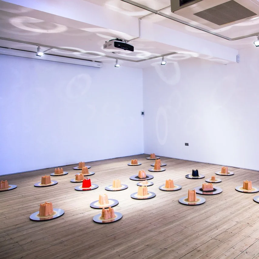 In Limbo - liquid silicone casts, mirrored discs, sand, pigment, 2016