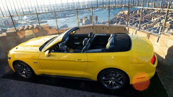2015 Mustang GT convertible with a view of Manhattan