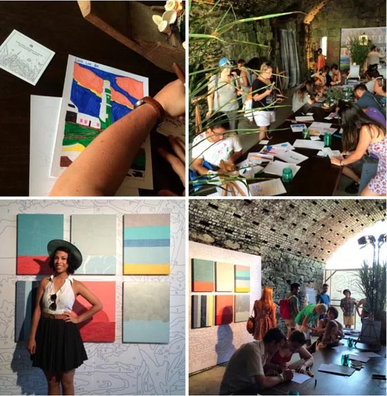Concert goers take an art project break; Monica from Phox strikes a pose with my Abstract Sailboat & Lighthouse paintings