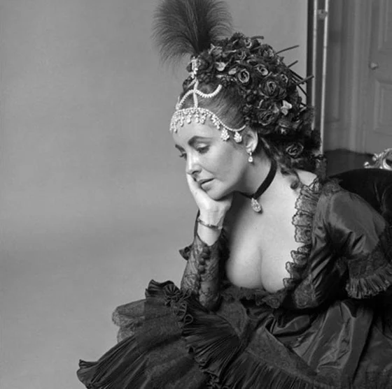 ELIZABETH TAYLOR: Cecil was no fan of Elizabeth Taylor. When he was asked to photograph her in April 1968, he asked for the exorbitant fee of five thousand dollars and was delighted to be turned down: "She’s everything I dislike." But he had to photograph her here, at the Proust Ball in 1971, on which occasion he picked her apart, jewel by jewel.