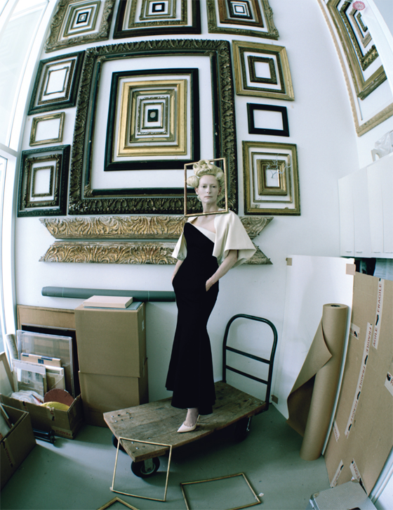In the framing department of the Menil Collection, Swinton wears Calvin Klein Collection
