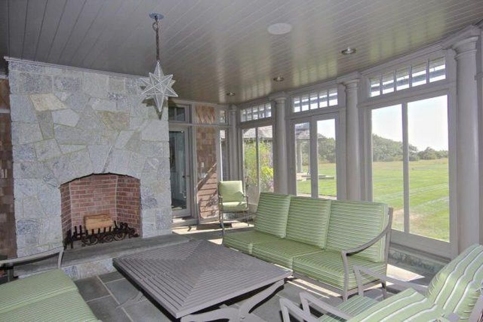 https---blogs-images.forbes.com-kathleenhowley-files-2019-09-porch-with-fireplace-e1567364745313.jpg