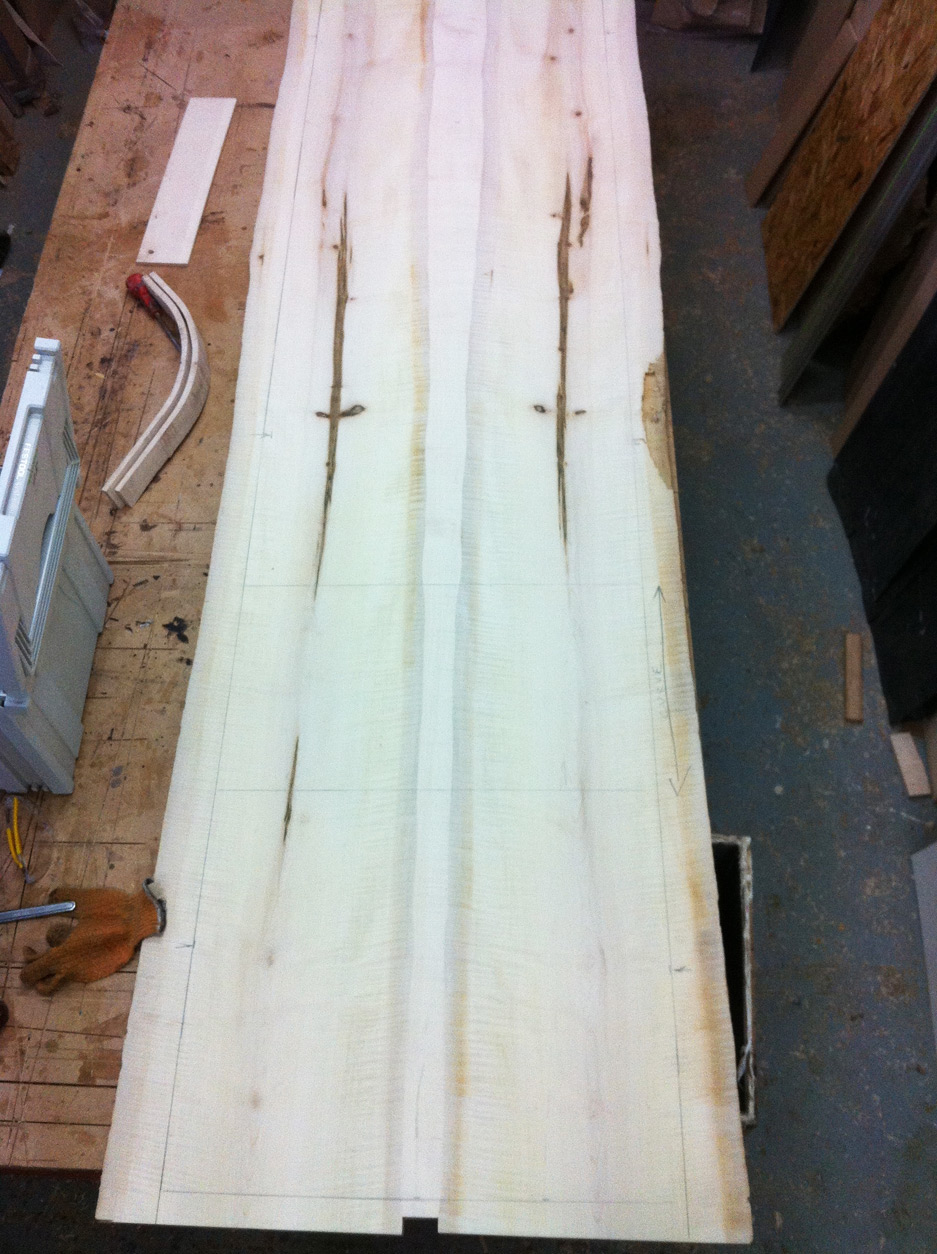 The picture shows two pieces of solid ripple sycamore over three metres long and 60cm width, are joined along the waney edge with a narrow infill.