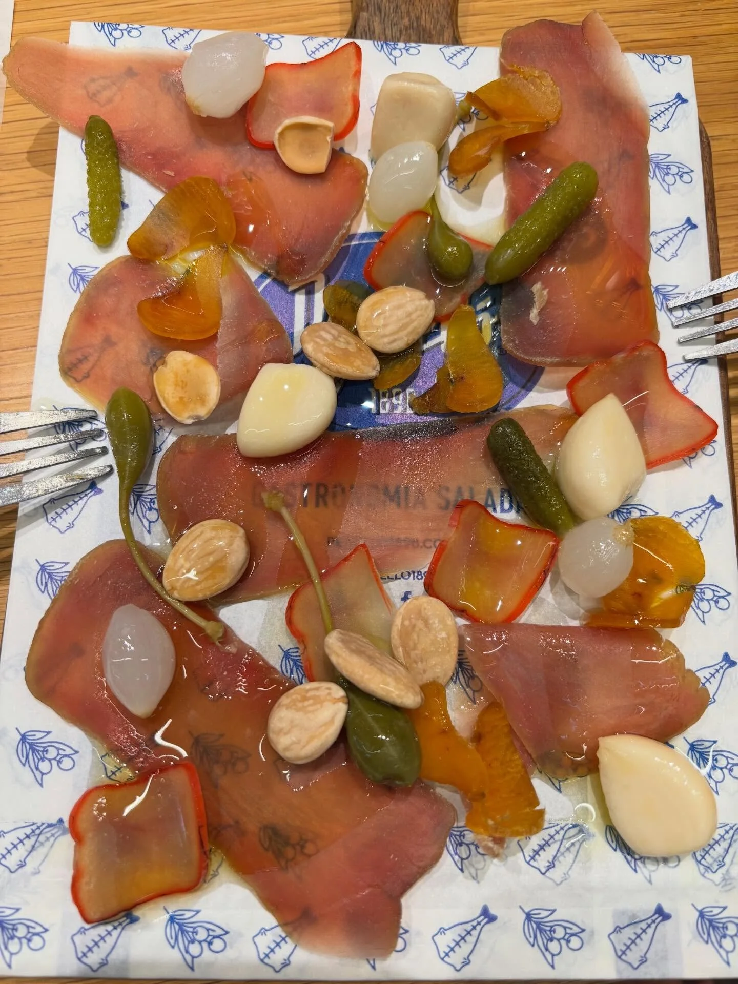 Mojama, dried cured tuna sliced impossibly thin, with capers, almonds and olive oil. Great with a younger fino sherry. That&rsquo;s some real C&aacute;diz stuff. 
@mojama @cadiz @spanishfood