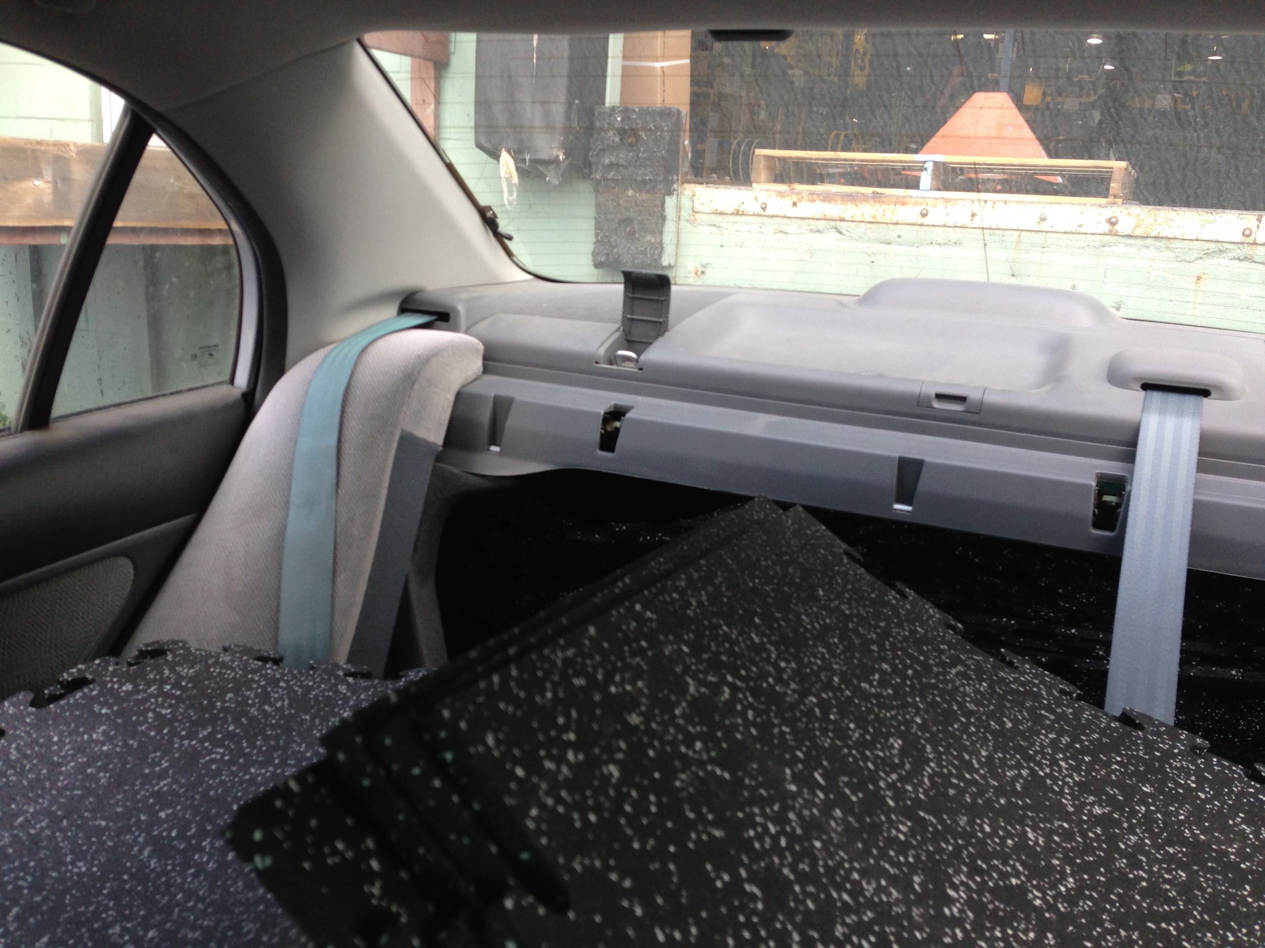 I managed to load all of the flooring tiles into the back of my Honda Civic. The seat had to be folded down, but I managed to fit all of the tiles in!