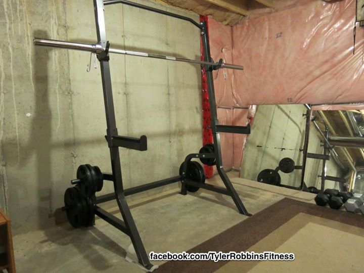 A picture I snapped early 2013 after I purchased an assembled my squat rack. This gives you a basic idea of my basement.
