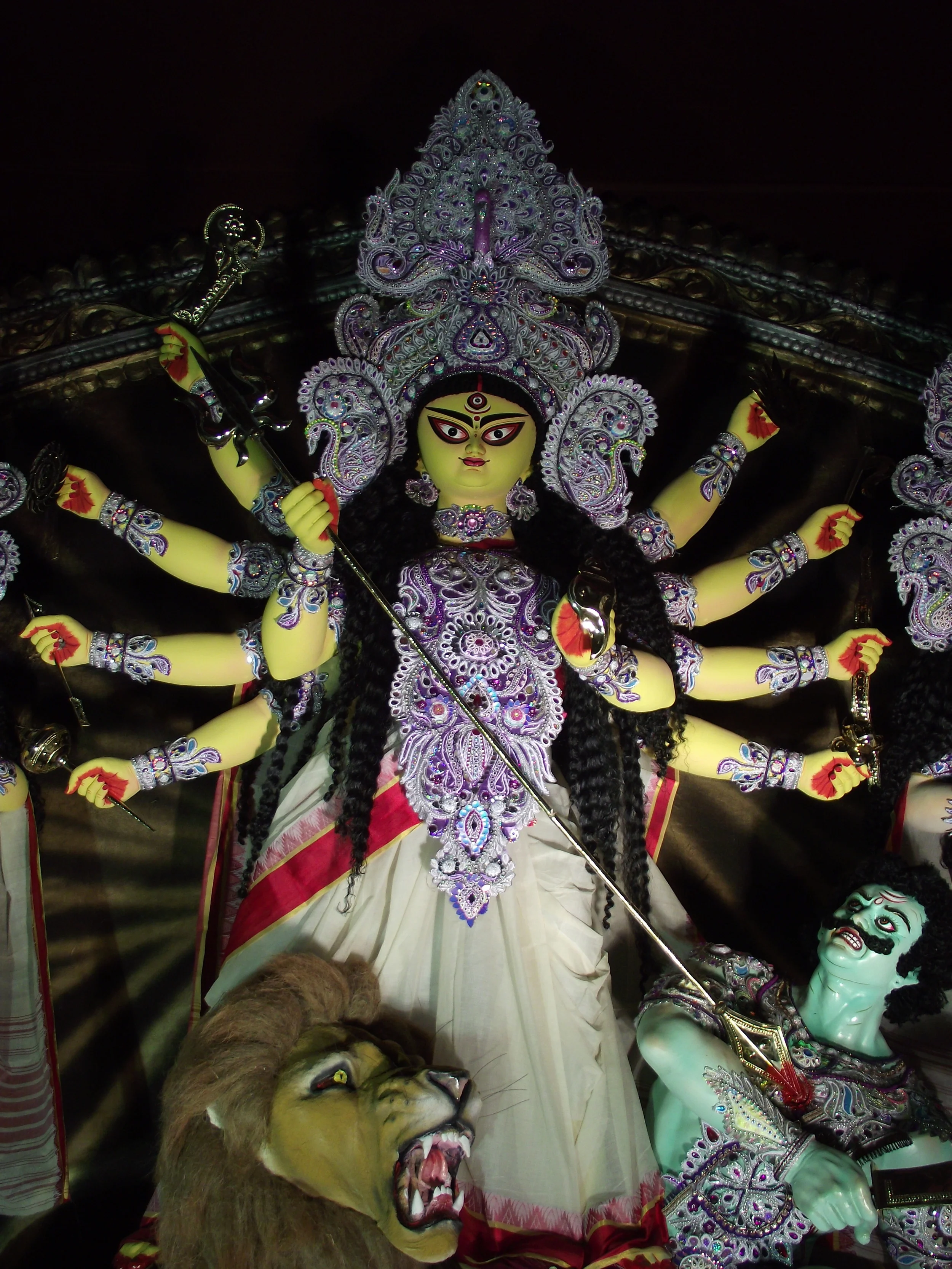  The angry face of Maa durga and her lion is determined to eradicate the evil and asura. This is the original look of devi Durga before the theme pujas have spread their wings. 