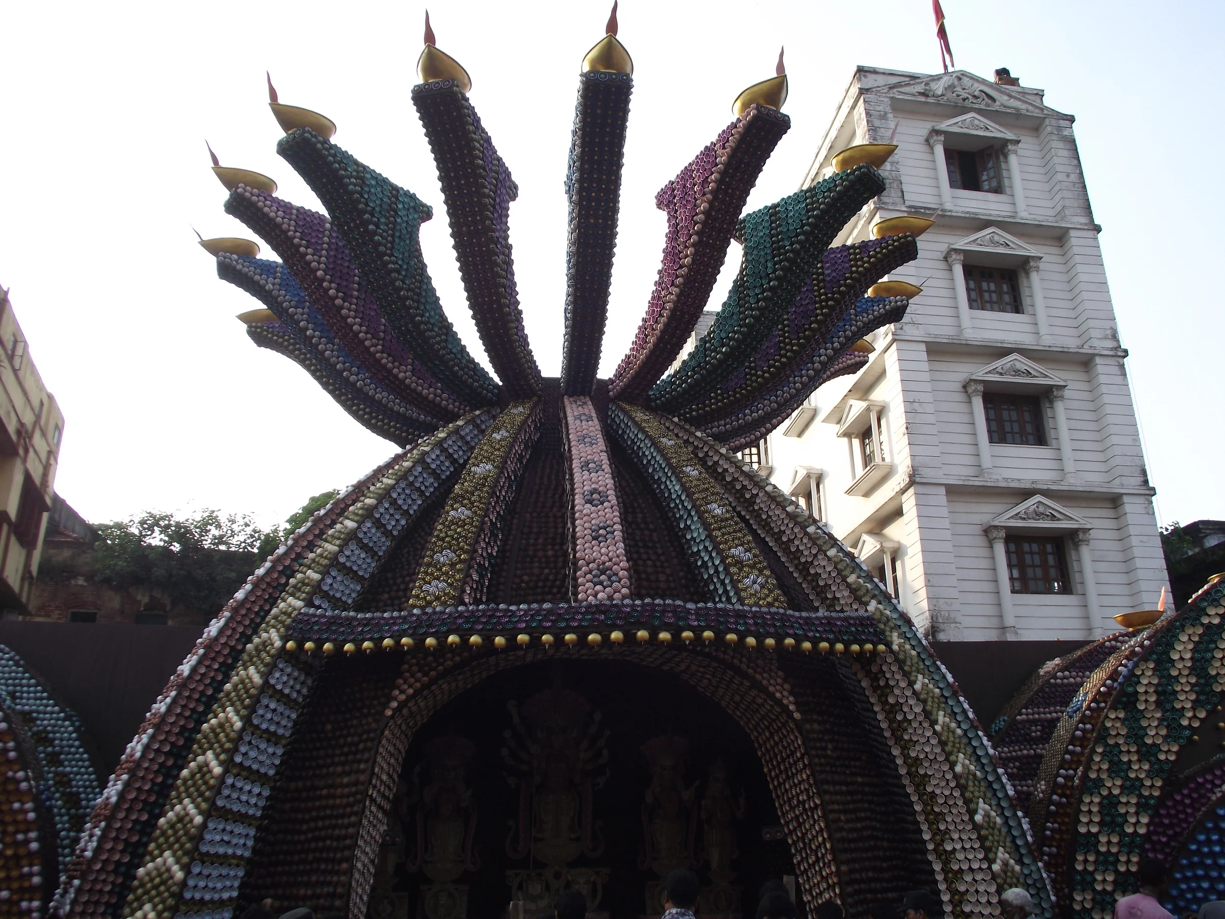  The entire structure is wrapped with coconut shell with minute paintings in each of them. 
