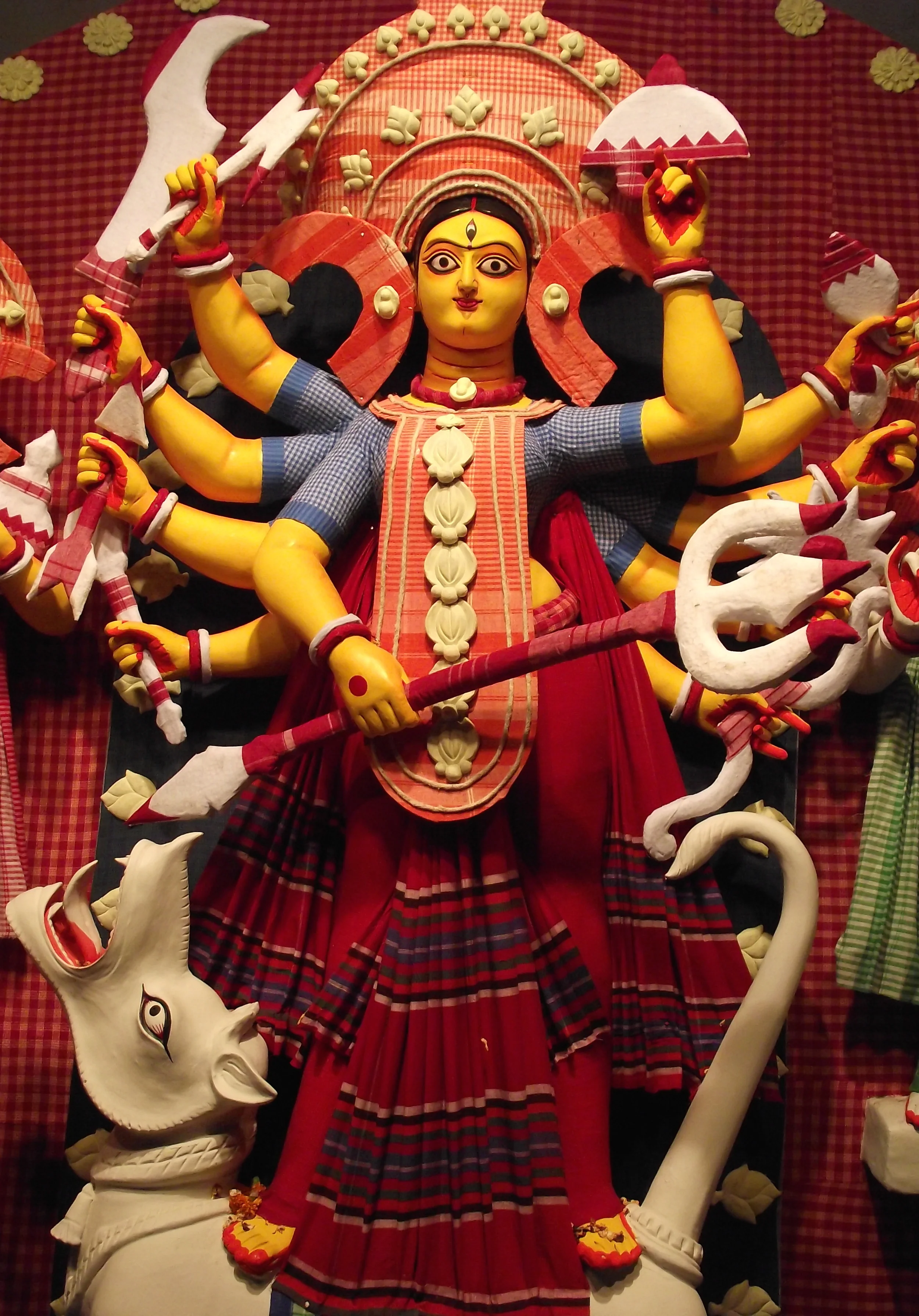  Close up view of maa Durga.&nbsp;If you are aware of  gamuchas  you can observe the variety that has been used in an artistic manner. 