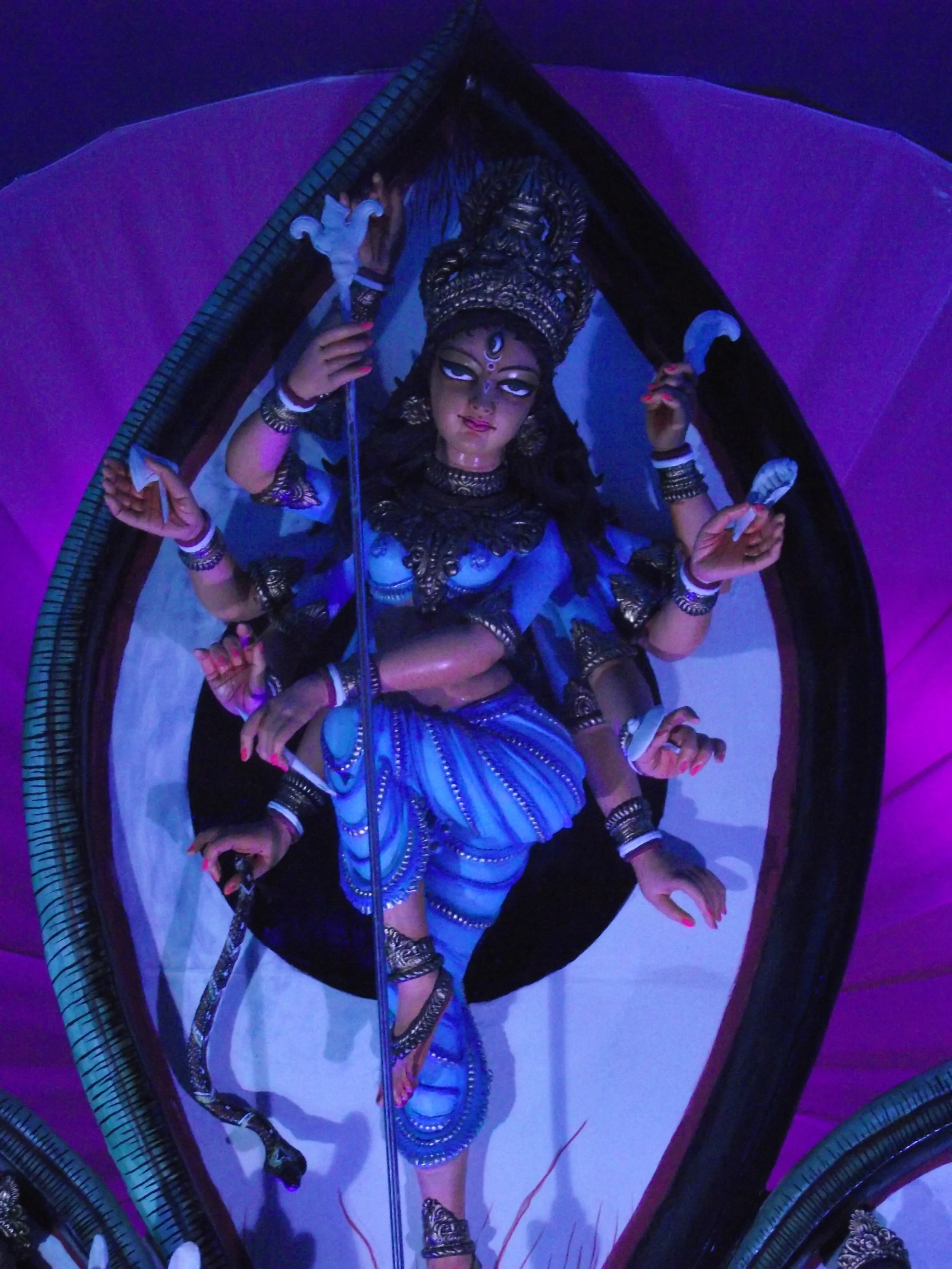  Durga was also created in the backdrop of a  trinoyon.  She had a calm yet determined face to get rid of the evil from this world. 