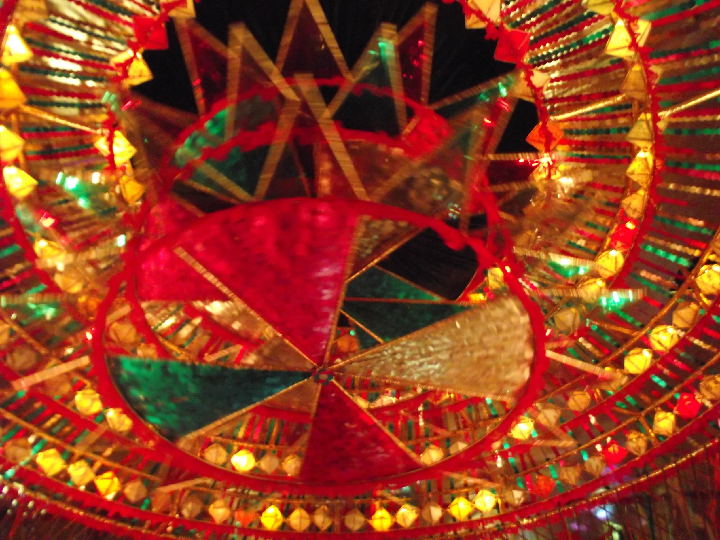  Revolving wheel with lights creating shadows in the backdrop... 