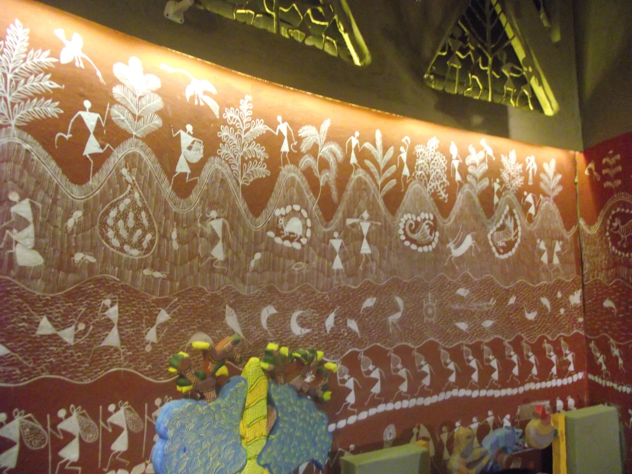  Every wall was a canvas of detailed Warli paintings... 