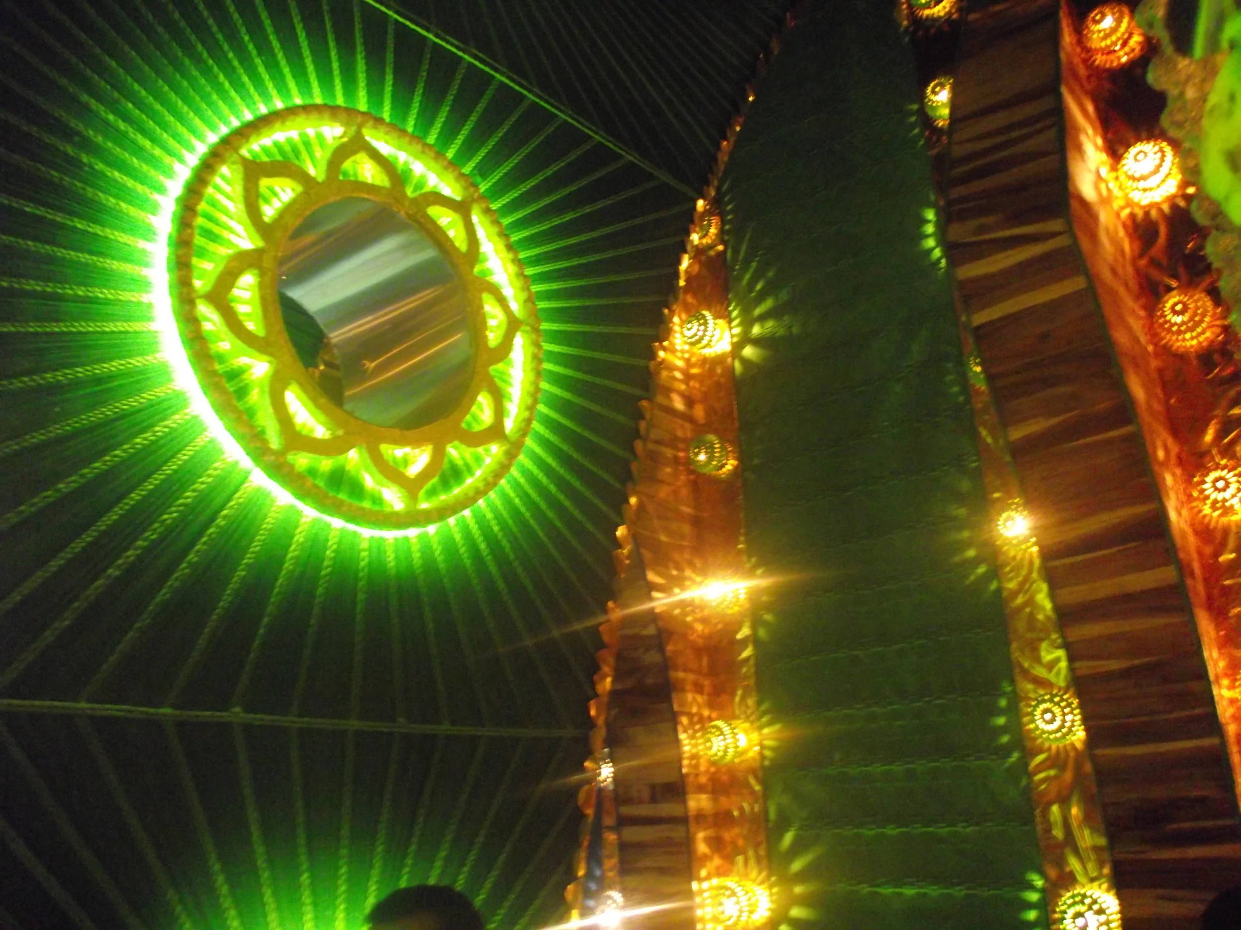  More symbols of peace glowing with green rays of light 