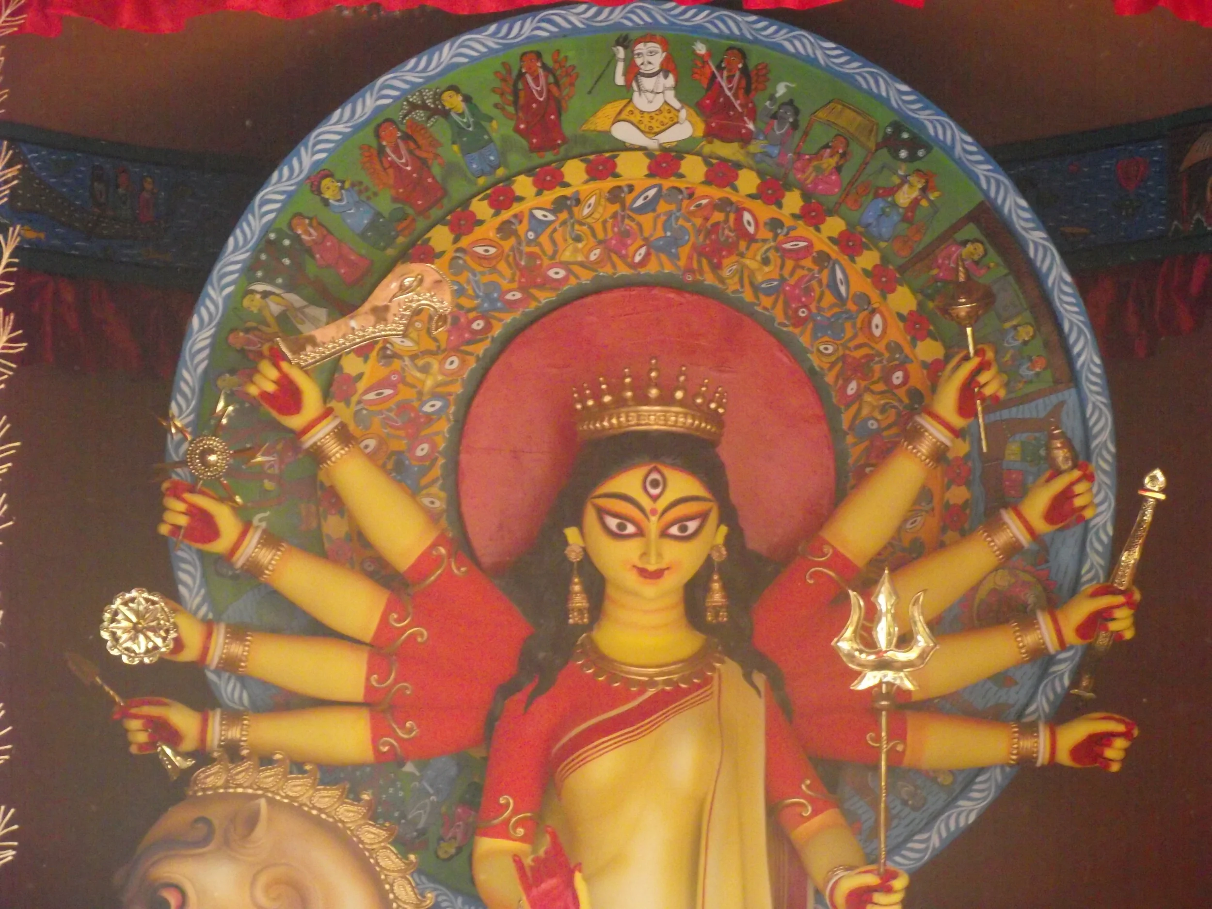  Notice the  chaalchitra  of Maa Durga which is has nice tribal patachitra paintings. 