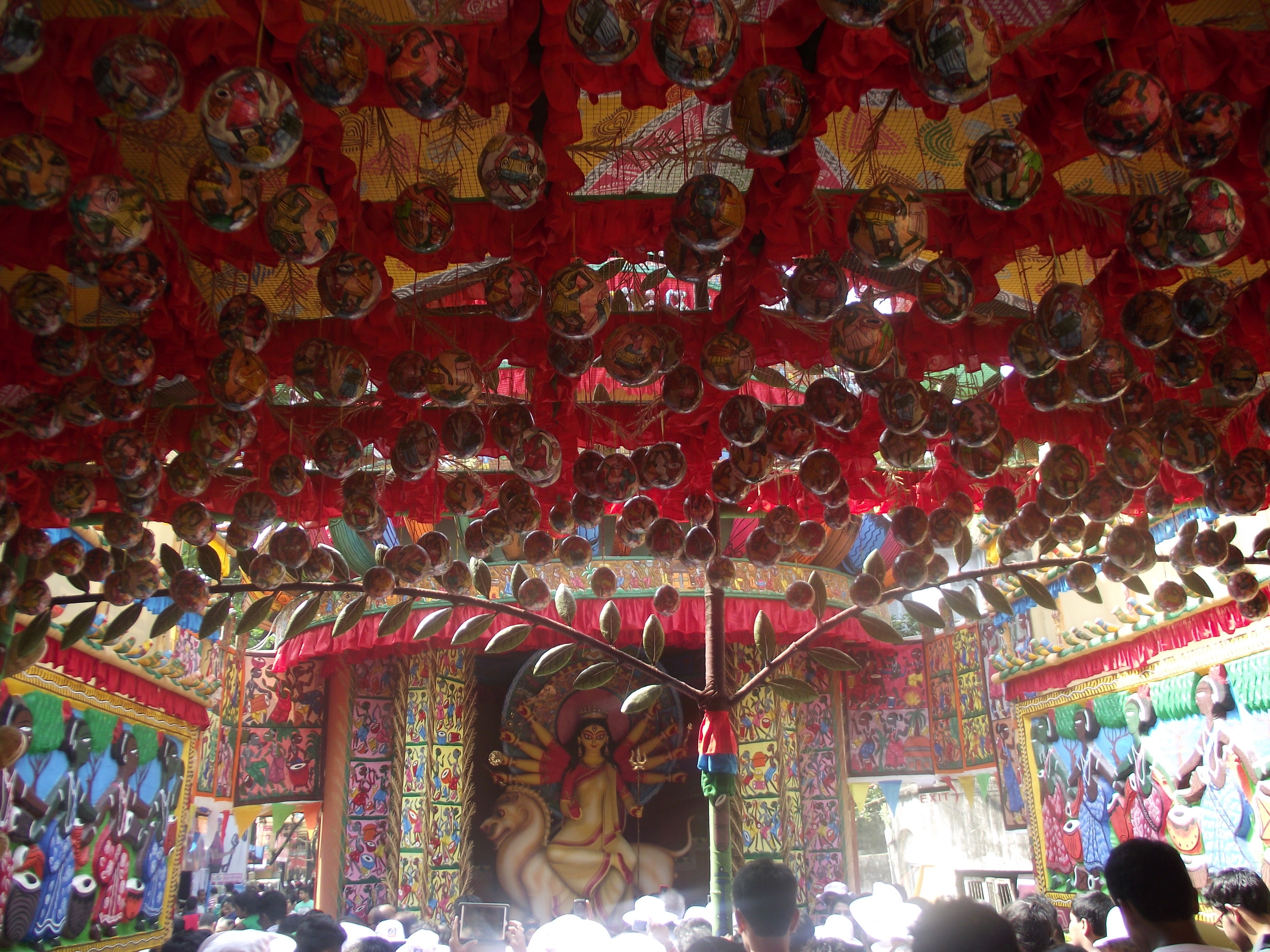  Symbolic representation of Kadam flowers (which are spherical in shape). In the open space also there is a representation of kadam tree. 