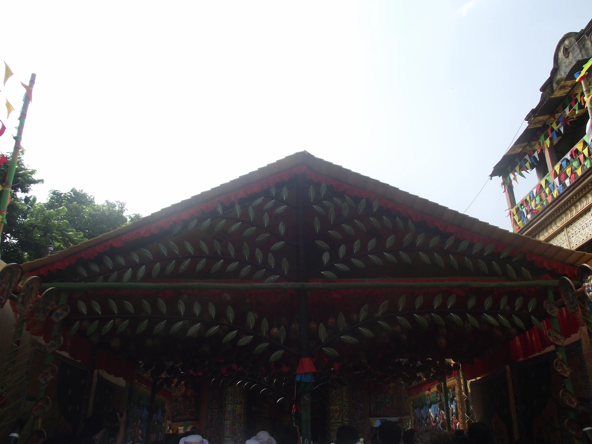 The entrance gate of the pandal has the shape of a spread out Kadam tree, the main subject around which this festival takes place. 