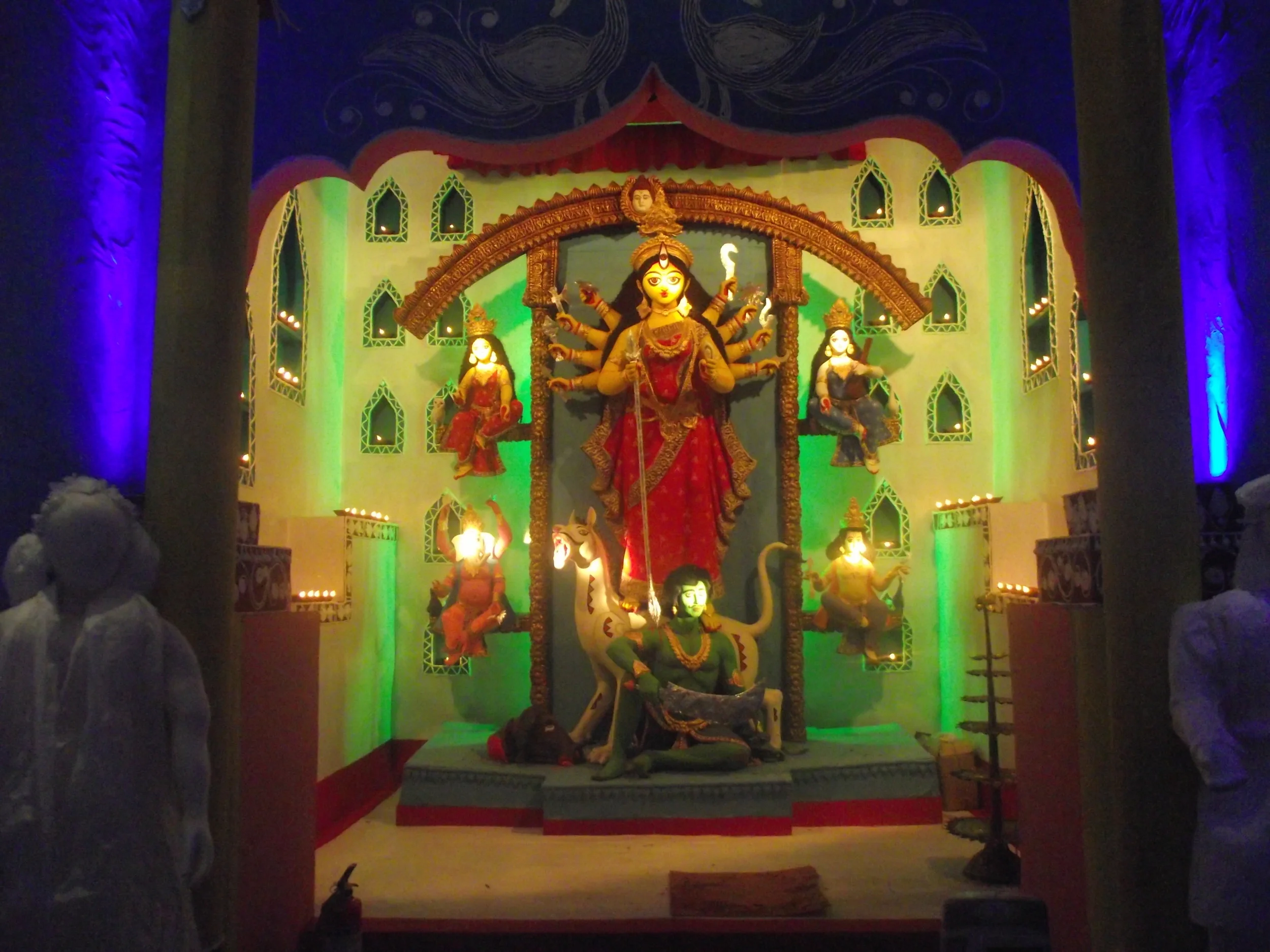  Durga  aradhana  in the temple premises of the palace while the devotees are looking on... 