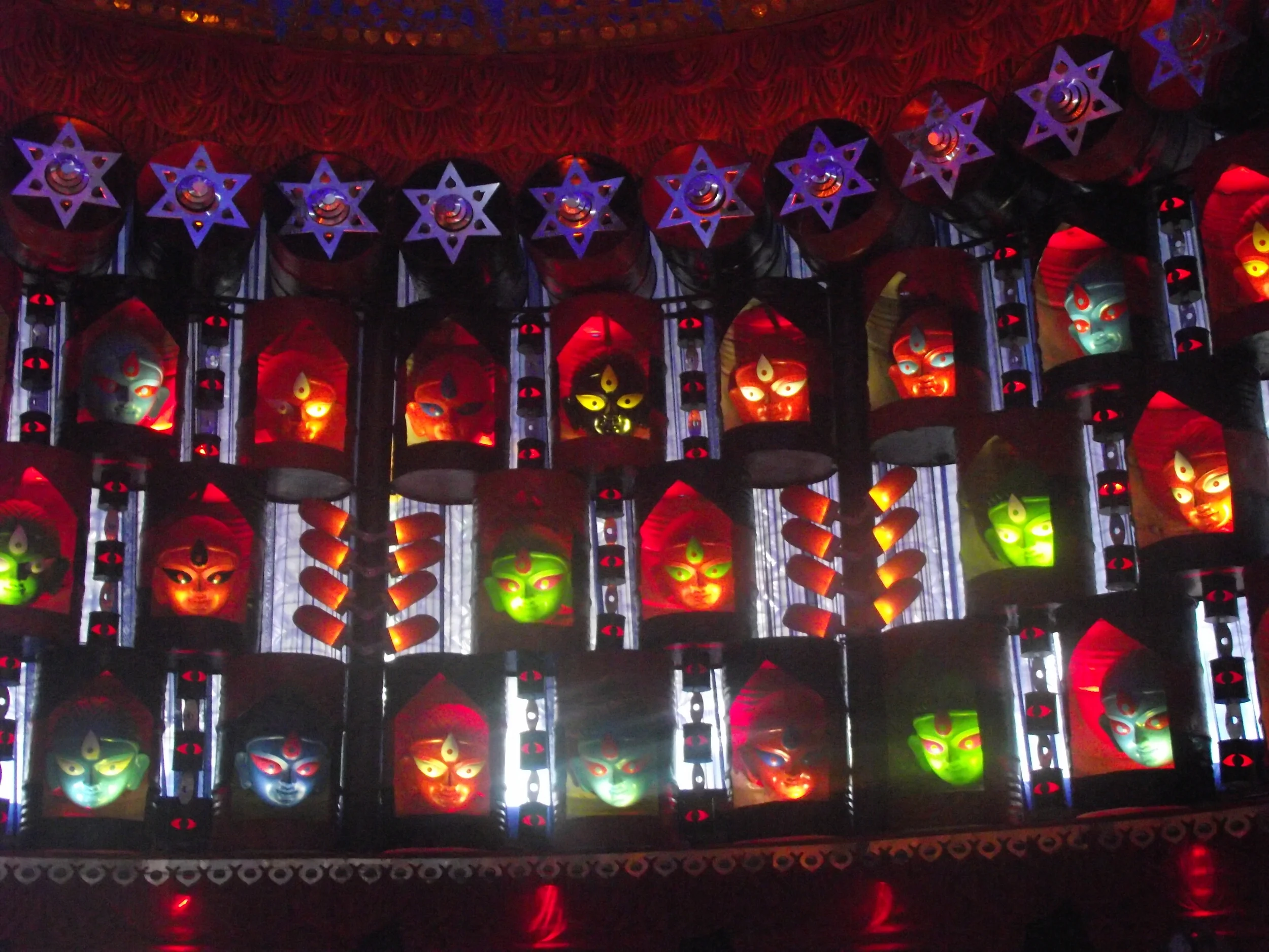  Every single drum was cut in a symmetric shape. The drum was a symbolic representation of a womb.&nbsp;A facade was placed in the drums and they represented female foetus. This was Dinda's way to sending the message to respect and help develop girl 