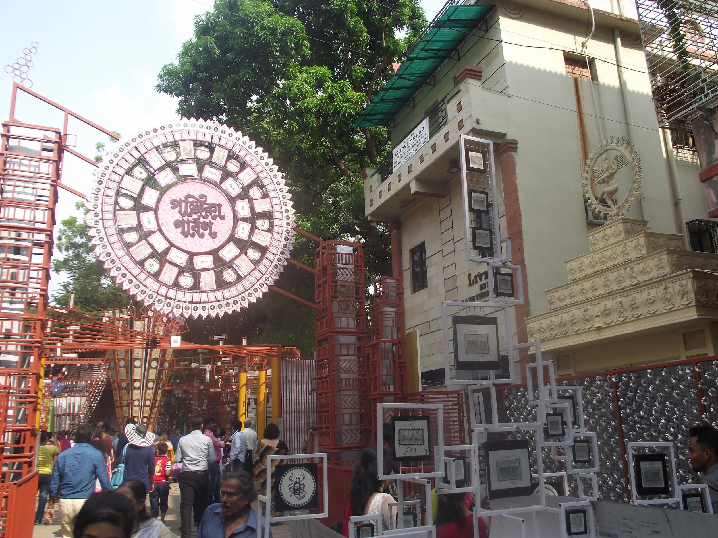  The entire puja setup from a distance. Shibmandir is also known for its innovative illumination. Thus music and lights in the evening would create a deeper feeling in the pandal premises. 