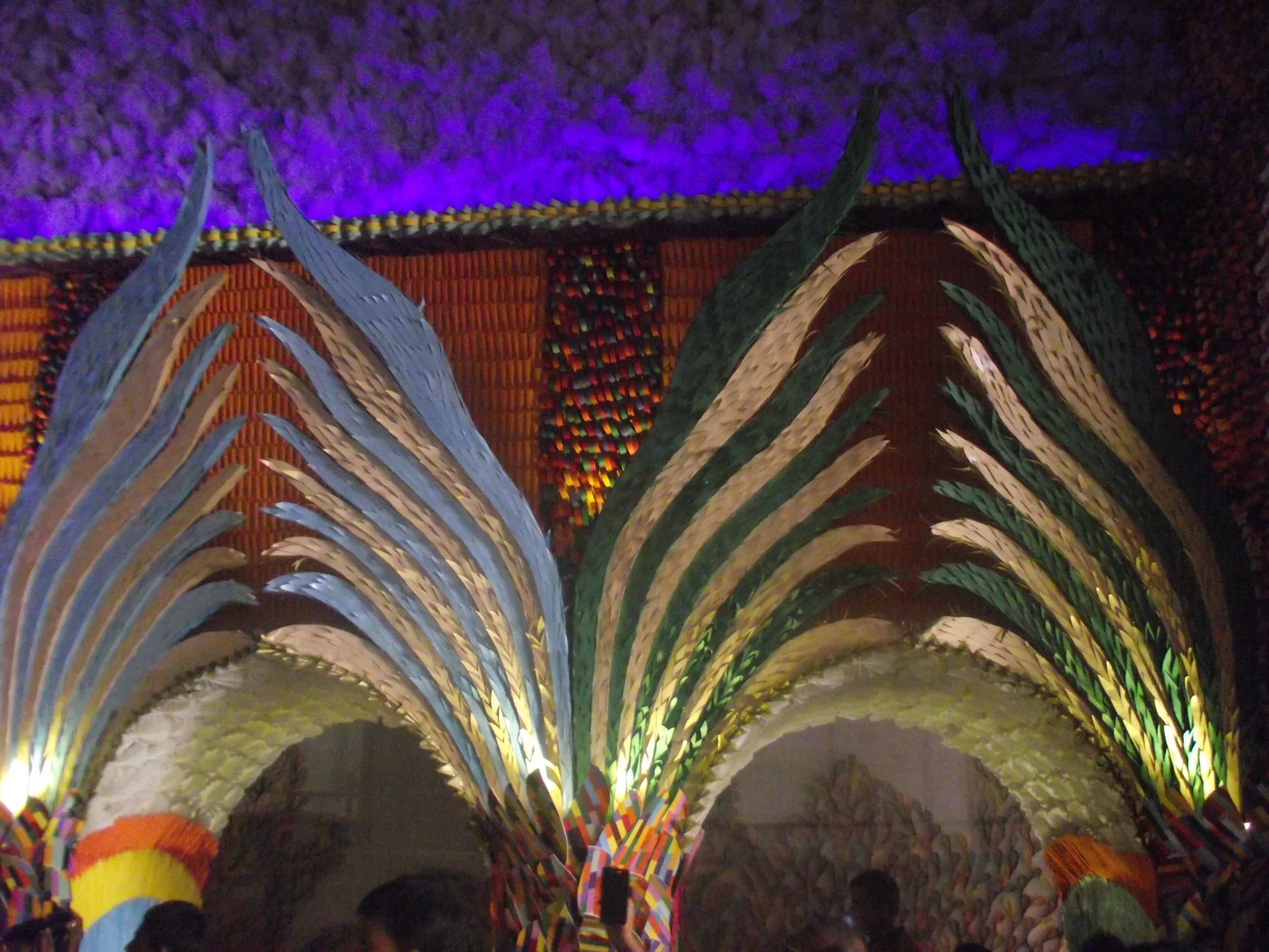  Observe the variety of paper art. Here colourful wings are created using different colours of paper... 