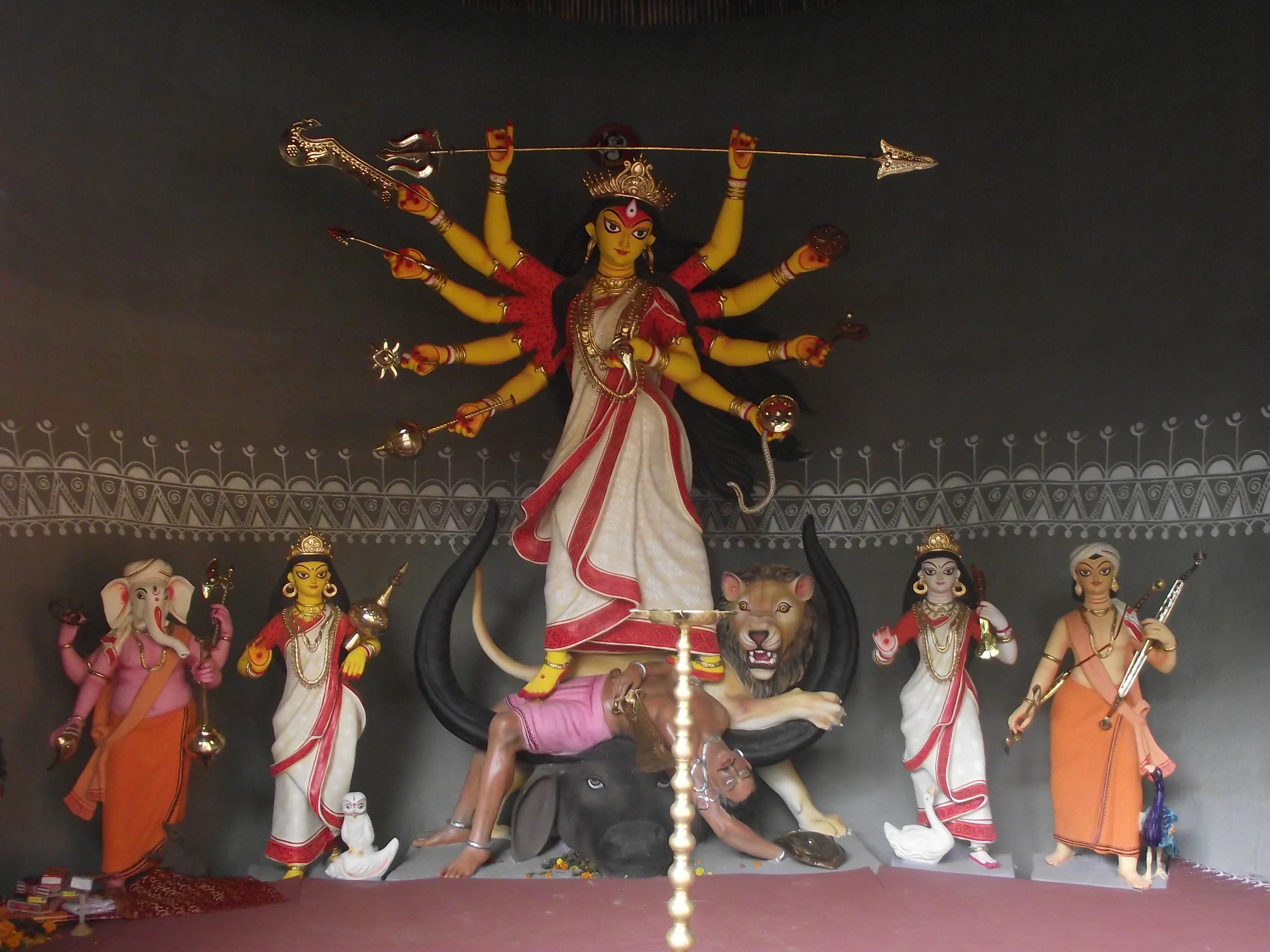  Maa Durga and her four kids responding to the musical rhythm of the pandal. 