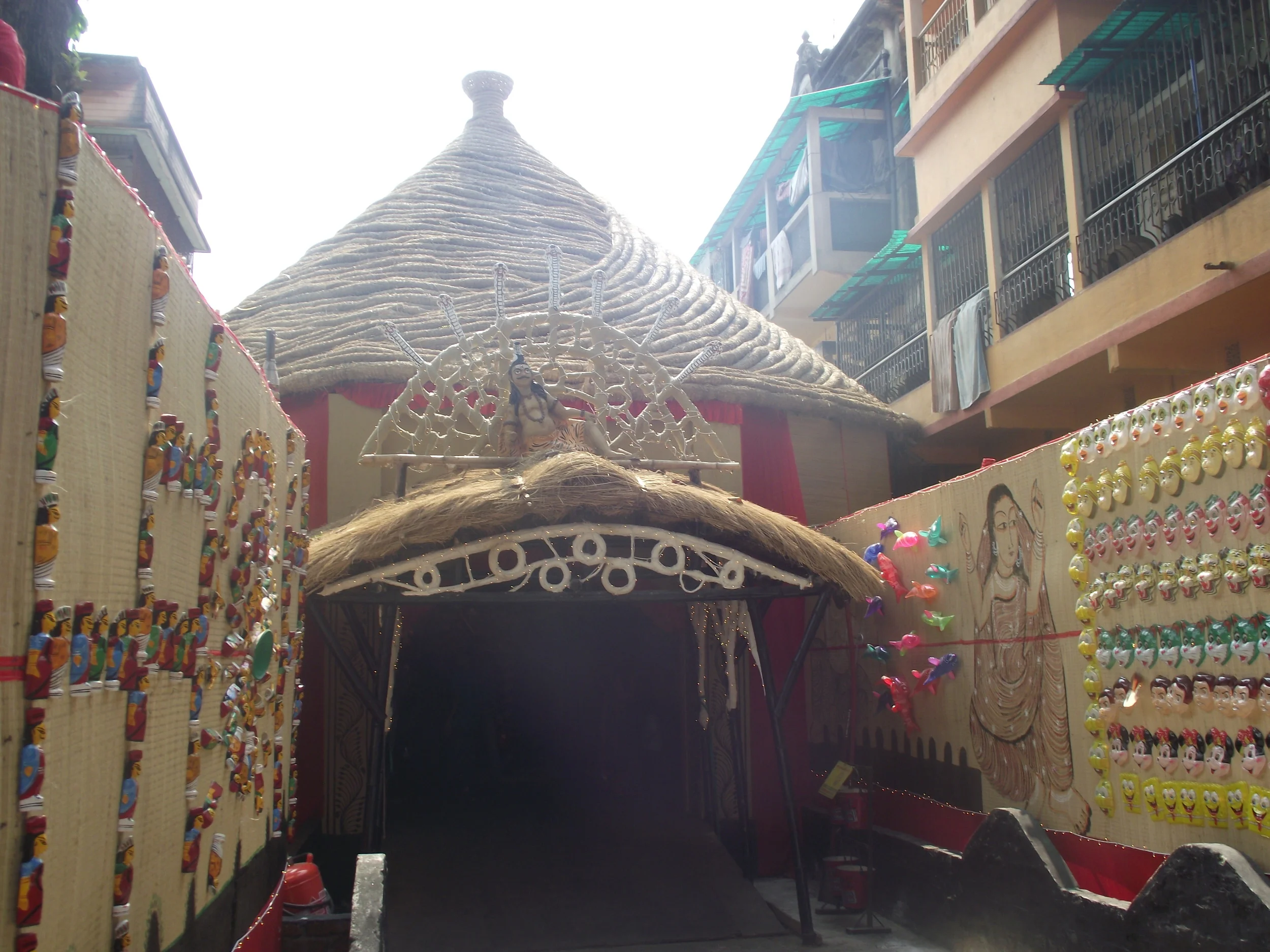  Entrance to the pandal. Since Shiv is the core subject of Charak puja he takes the epicentre of the pandal. 