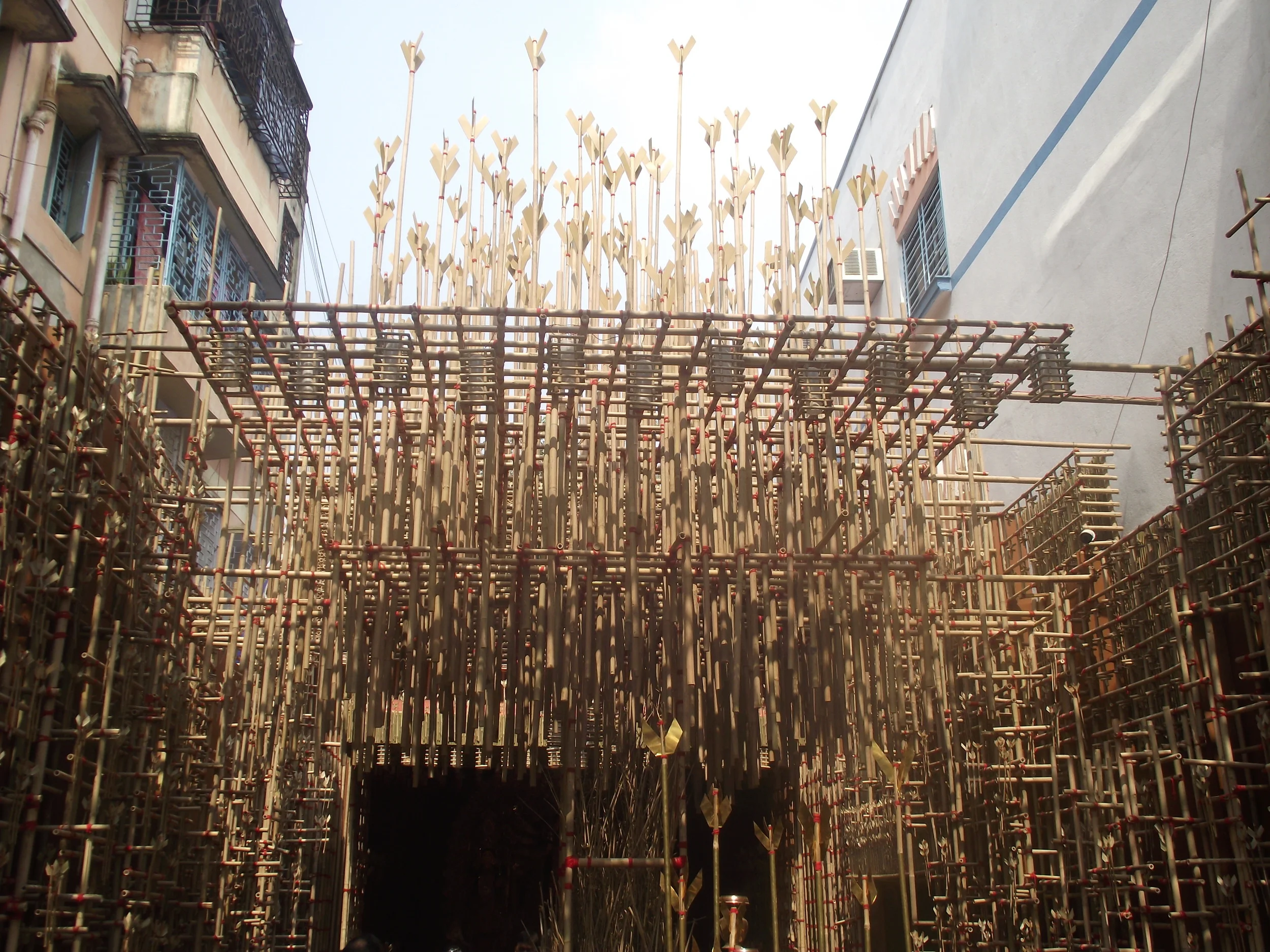  Many pandals choose a theme and use one material predominantly. However they also pick up other materials to complete their story. Adarsha Pally is an exception, they use only THE ONE material that is central to their theme. For example in this case