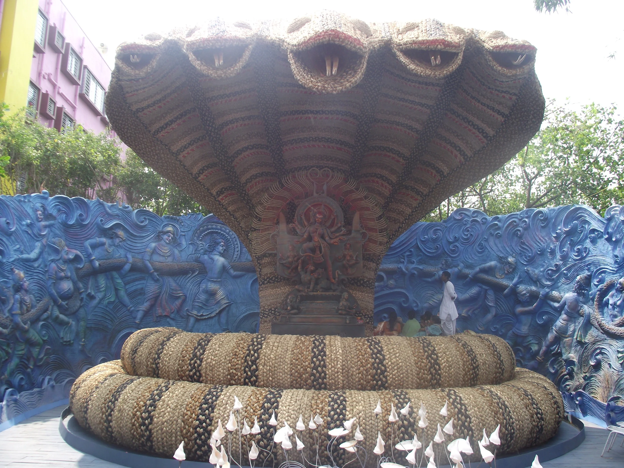   Here is the background of the story:&nbsp; Mount Mandara &nbsp;or  Mandar Parvat &nbsp;was used as the churning rod, and  Vasuki , the king of  serpents , who abides on Shiva's neck, became the churning rope. The demons demanded to hold the head of