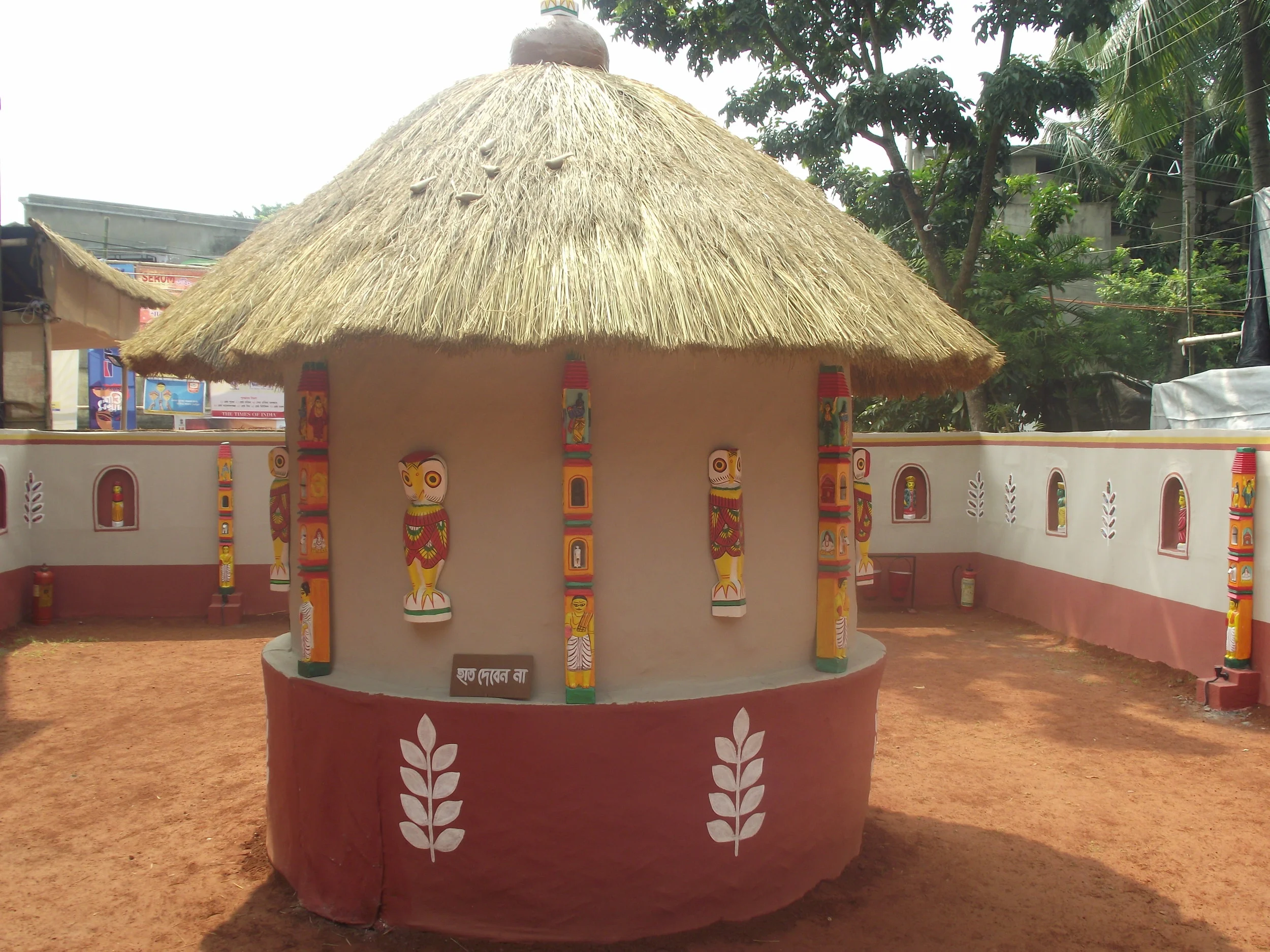  The entire compound of the pandal had a  laal mati  layer to take us to the origin of the  kaath putuls . 