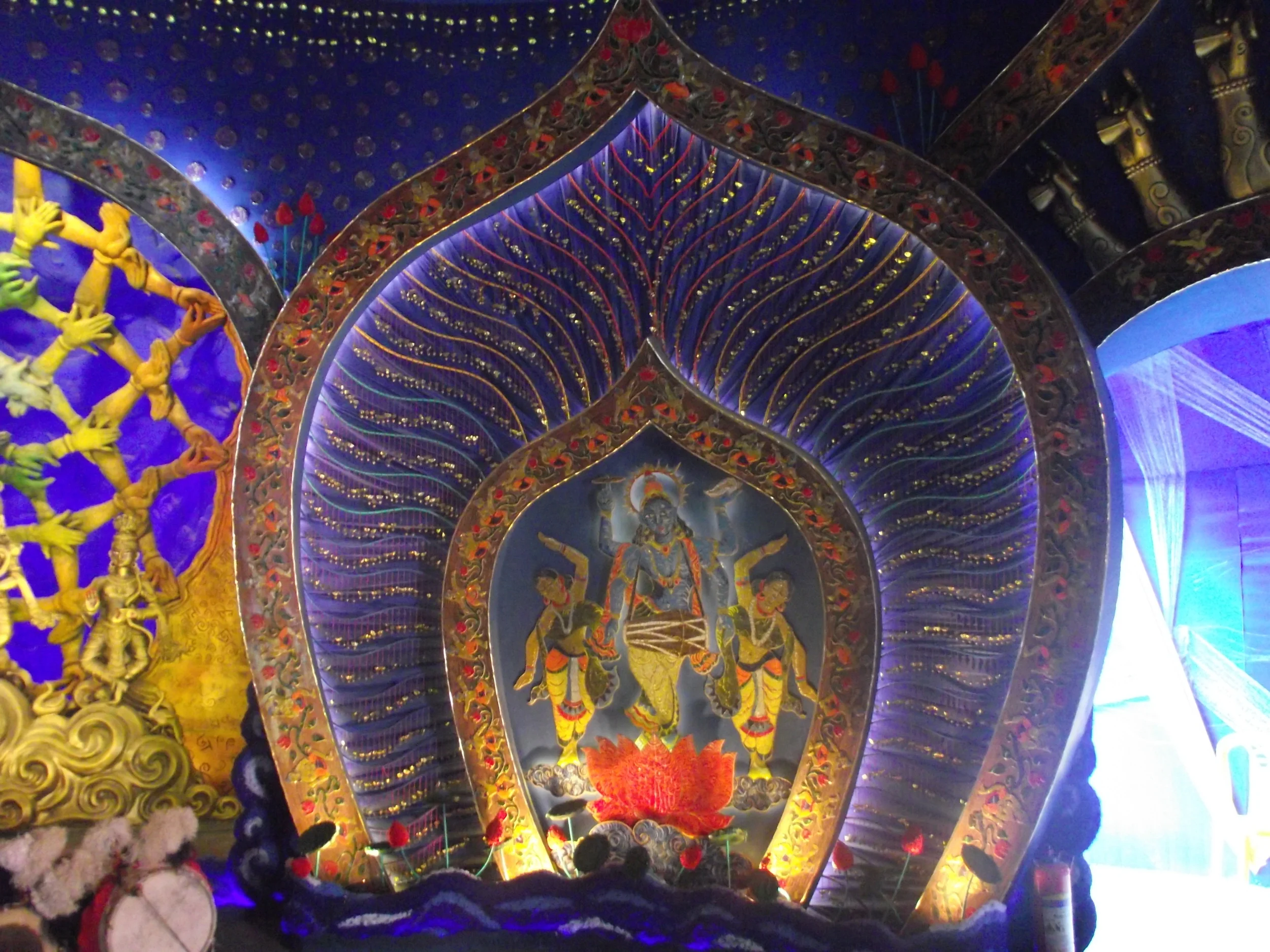  Different avatars collected to dance were part of the canvas in the walls of main pandal. Moreover peacock was chosen as the emblem of dancing, so each element will have a connection to peacocks! 