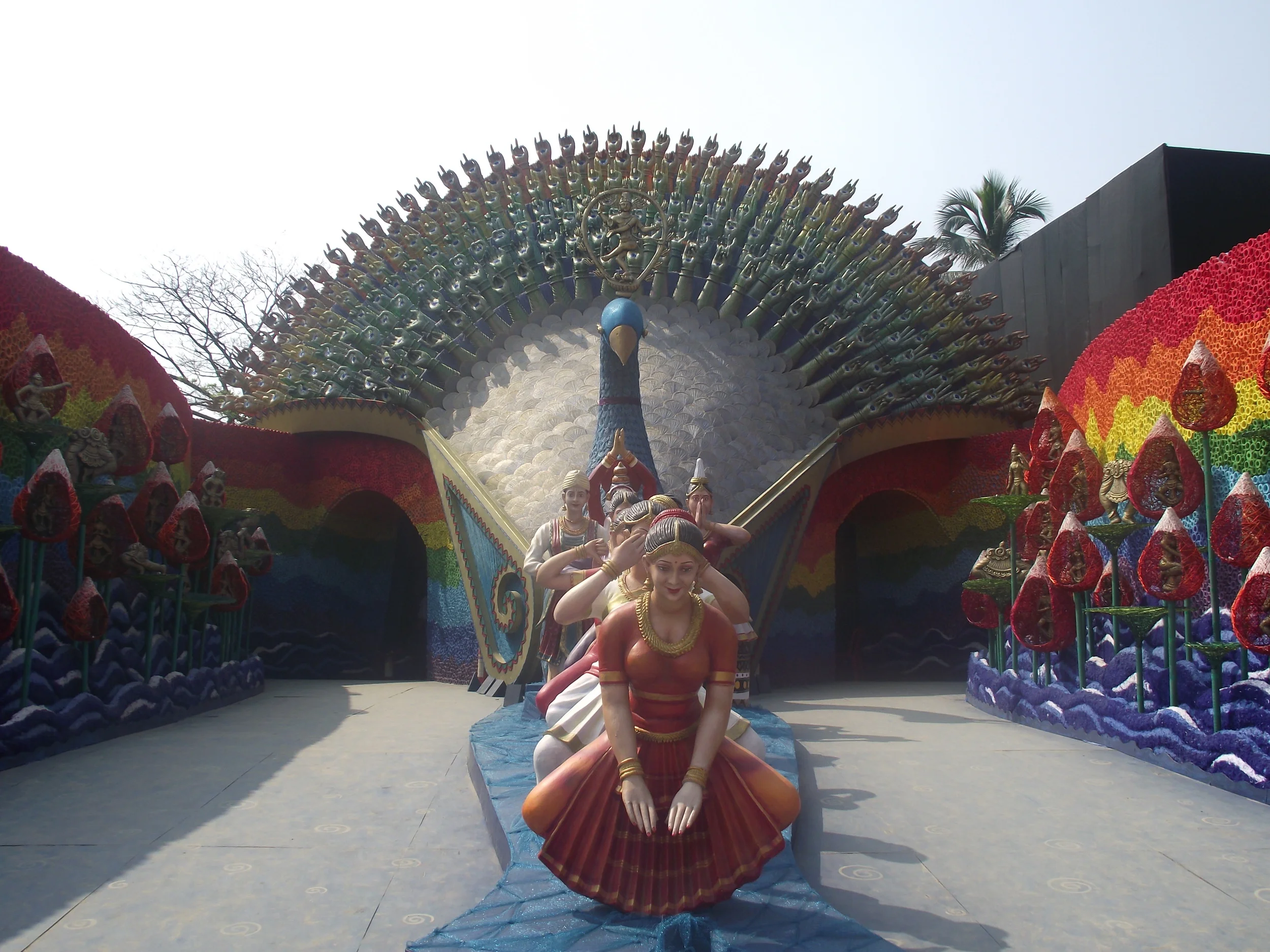  The front view of the pandal. Lucky to get a crowd free shot! (Observe how the wings of the peacock are also a composition of hands responding to the  nritya taals. ) 