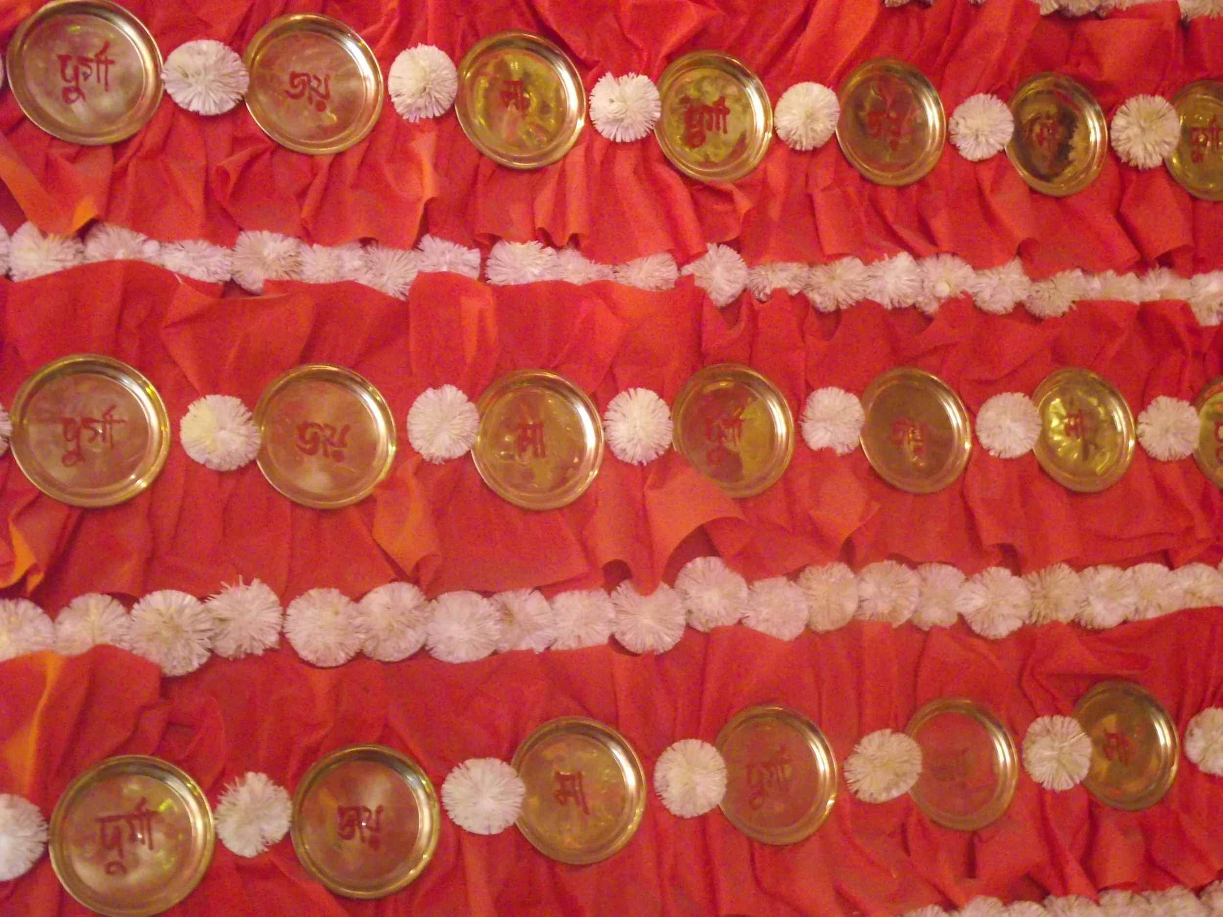  Kadam flowers, brass plates with worship slokas and the symbolic arrangement of them interconnected in the same line! 