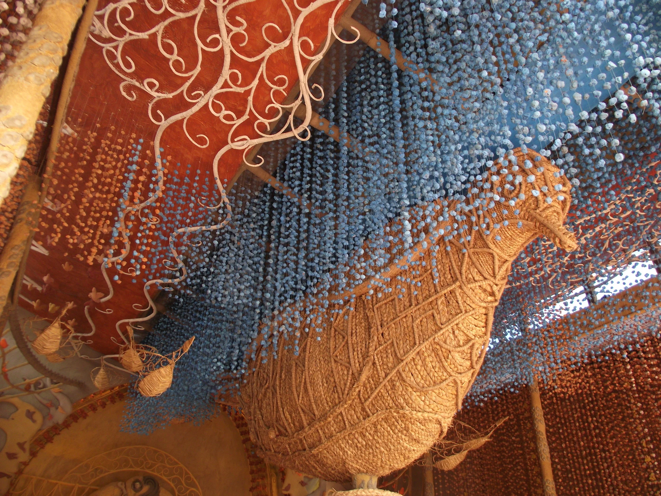  Bird created with ropes make of coconut shells... 