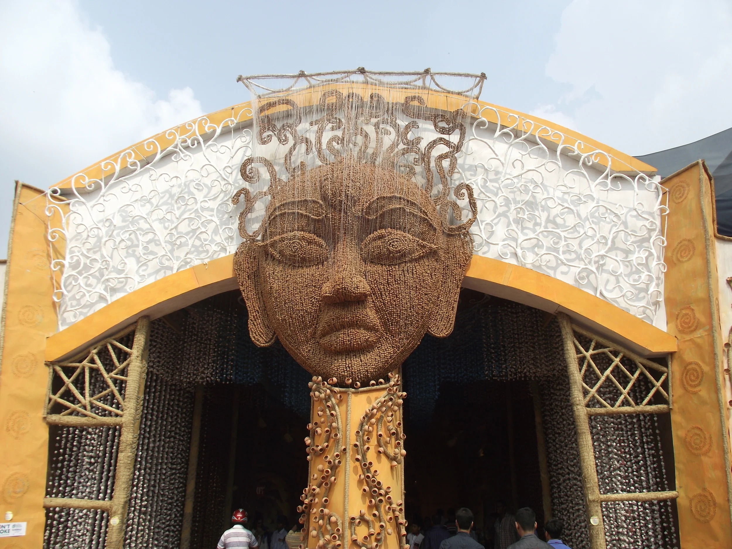  Entrance to the pandal. There was a nice rustic and rural music in the background. The structure at the entrance shows the connect of everything to  khiti (soil). &nbsp;Everything around us has the roots flowing into  khiti . 