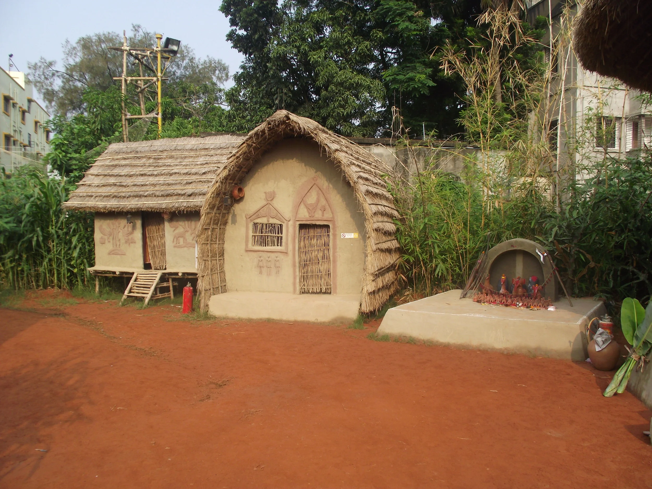  The adjoining village huts... 